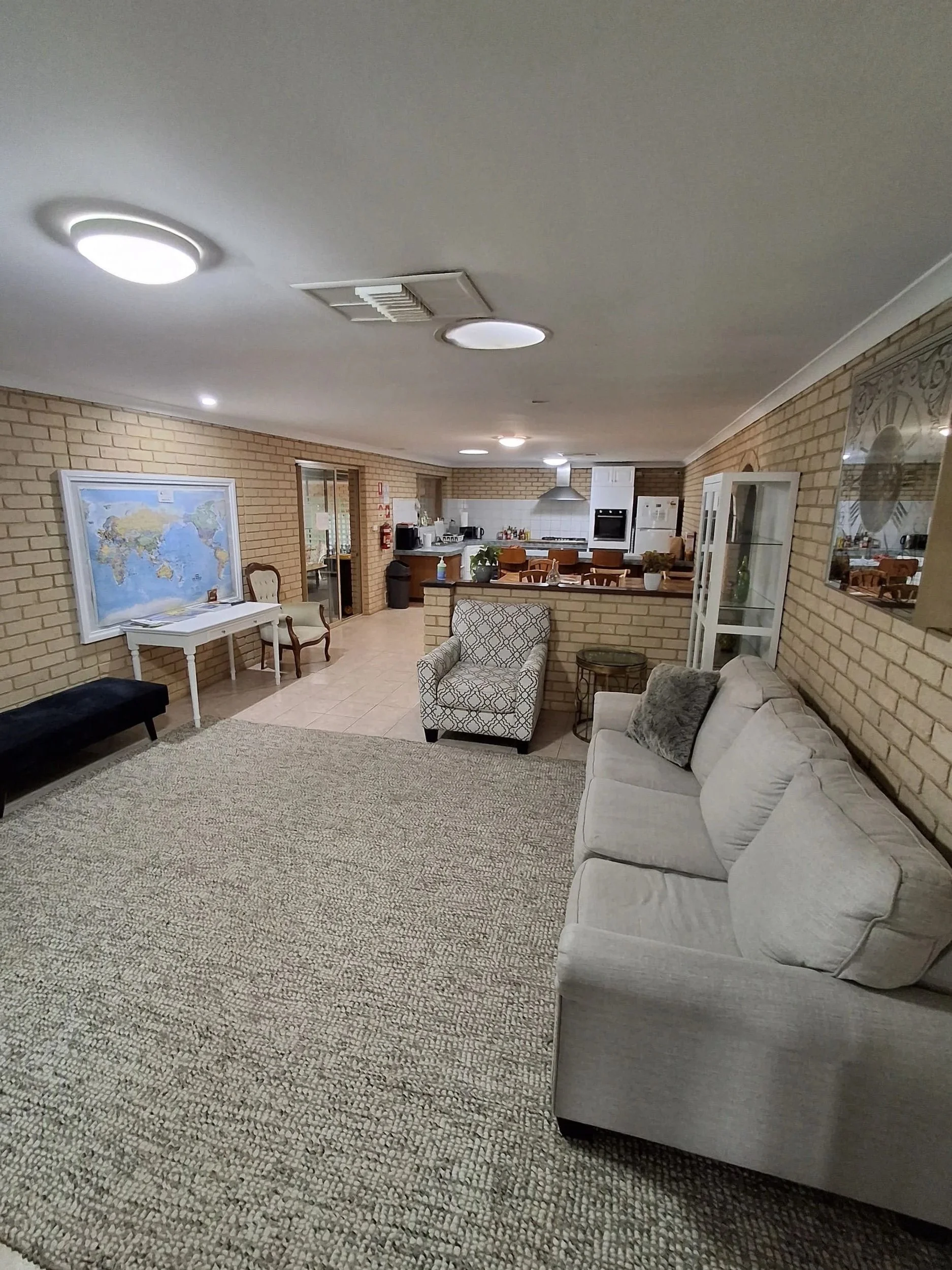 Communal lounge and kitchen available for guests at Rhodeside Lodge Geraldton