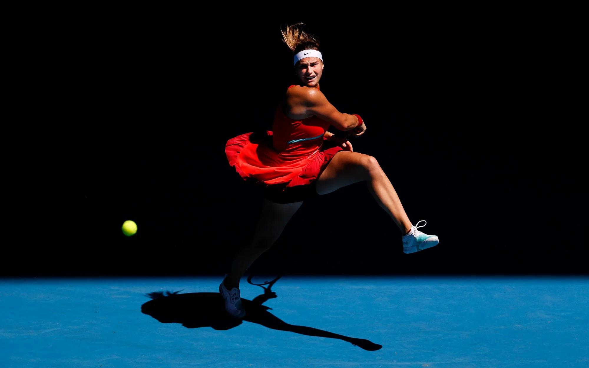 Aryna Sabalenka plays out of the shadows during the 2022 Australian Open.