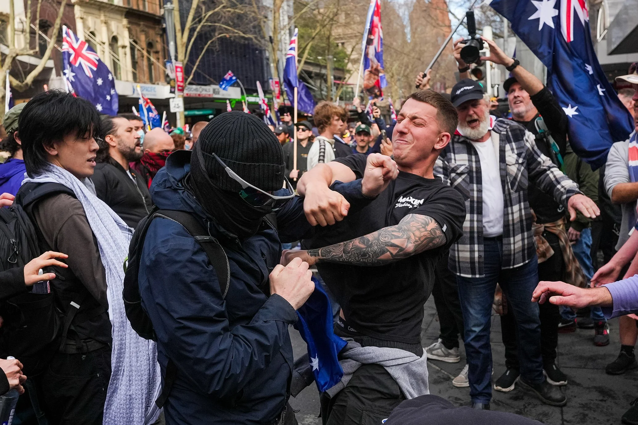 Anti-immigration protesters and counter-protestors clash in Melbourne Australia 2025