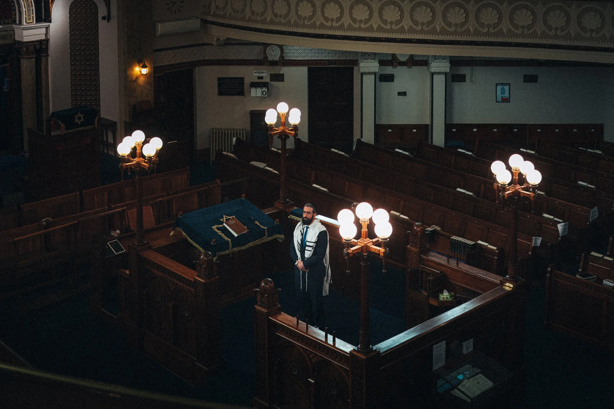 Rabbi Yaakov Glasman stands inside St Kilda Hebrew Congregation in Melbourne during COVID restrictions.