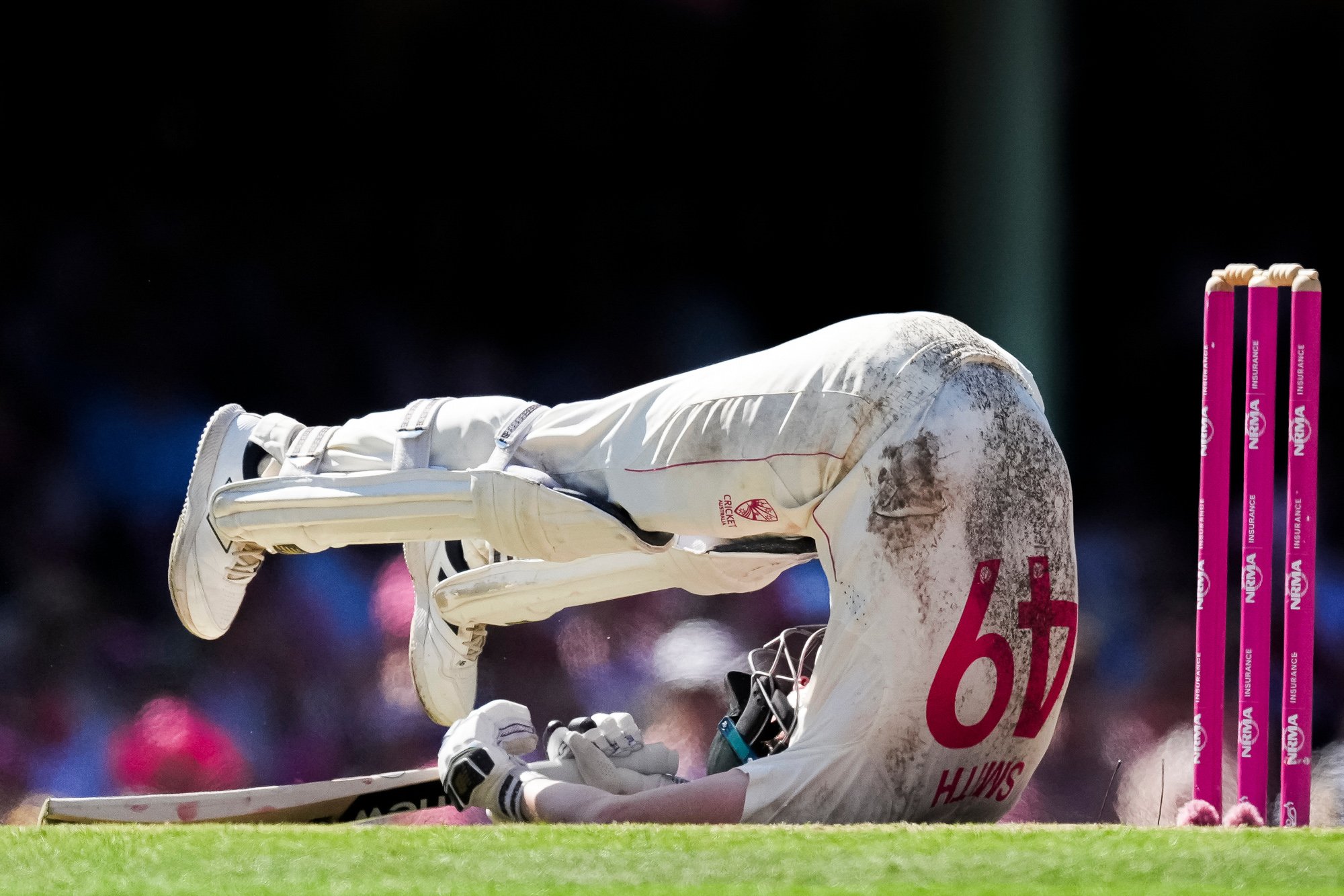 Australia’s Steve Smith evades a short delivery during a cricket match.