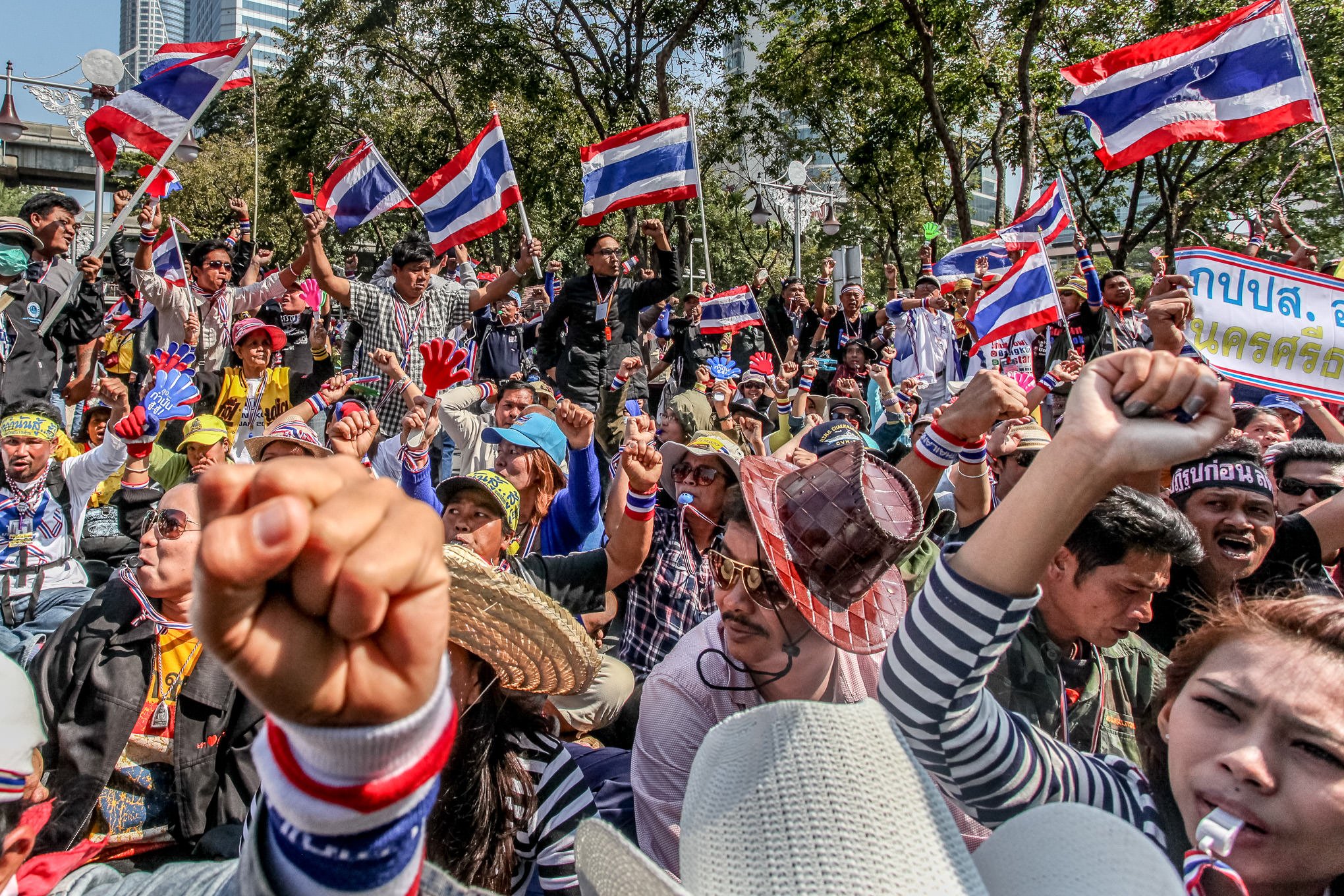 PDRC protesters gather inside police headquarters in downtown Bangkok during the Shutdown Bangkok protests in January 2014.
