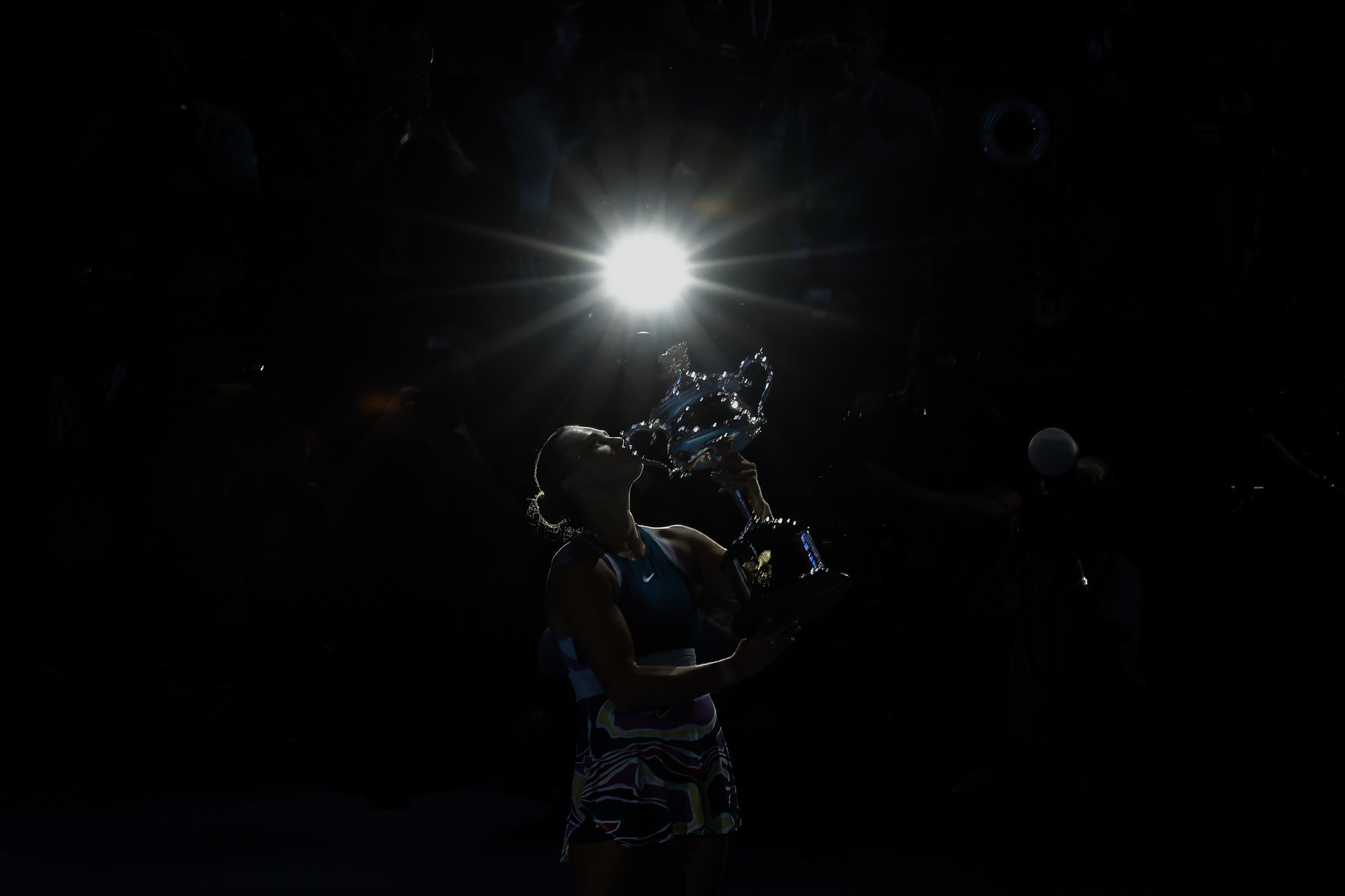 Aryna Sabalenka holds the Australian Open trophy after winning the women’s singles final.