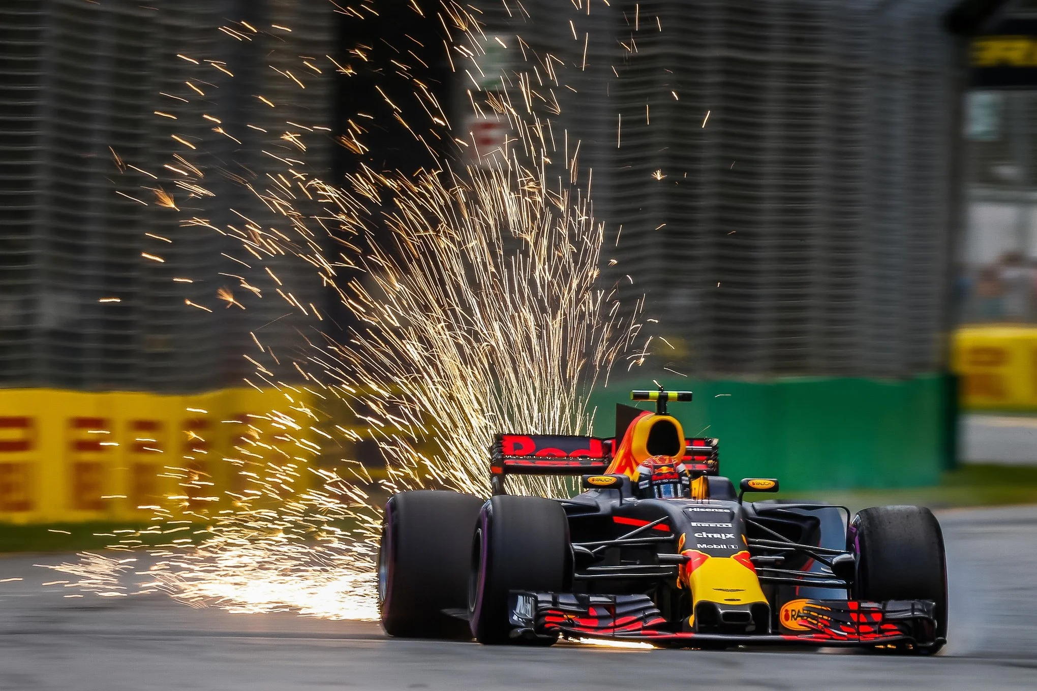 Sparks fly from Max Verstappen’s Red Bull during the Australian Grand Prix.