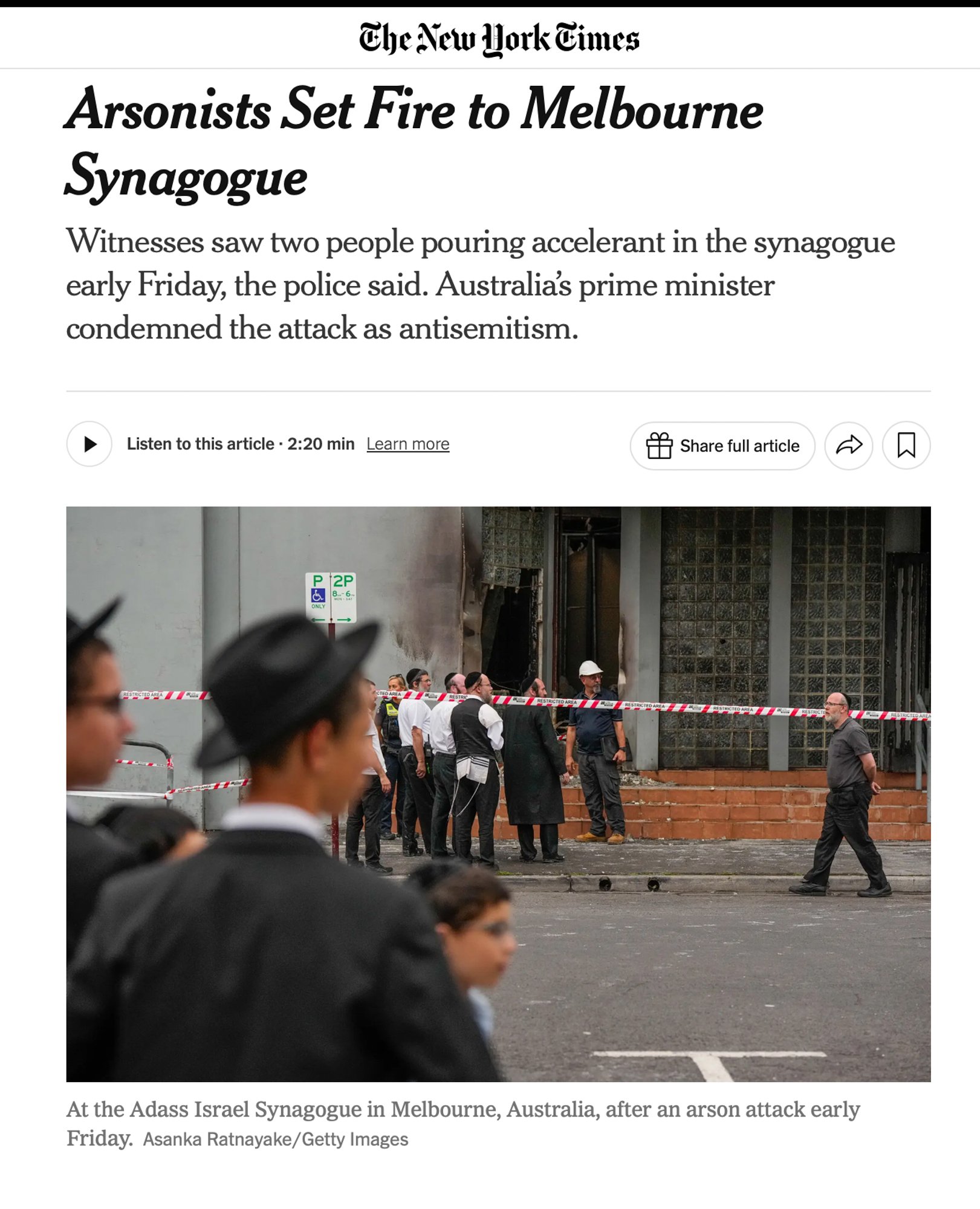 New York Times online clipping for “Arsonists Set Fire to Melbourne Synagogue,” featuring photography by Asanka Brendon Ratnayake.