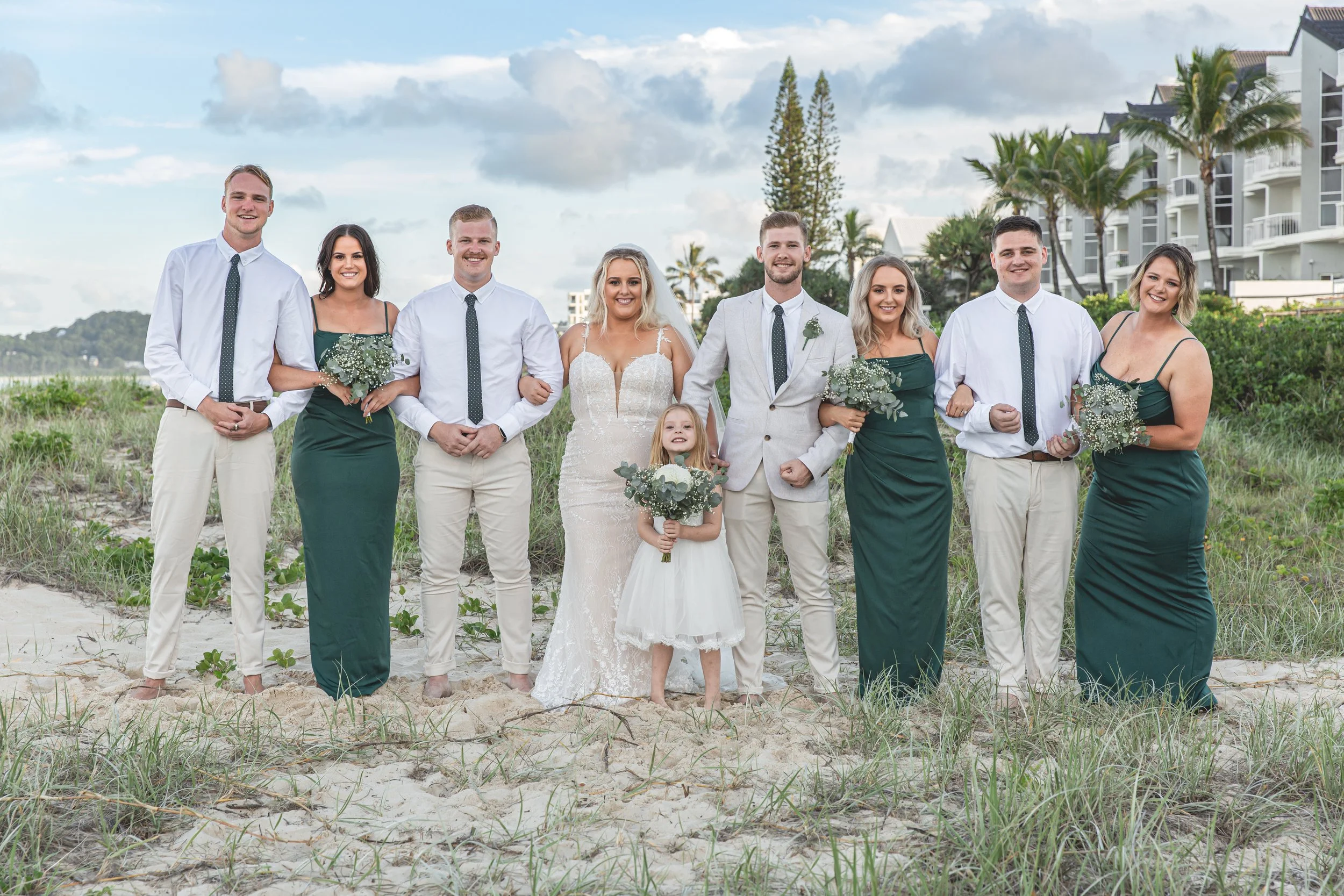 Bridal party on Gold Coast beach for wedding. 