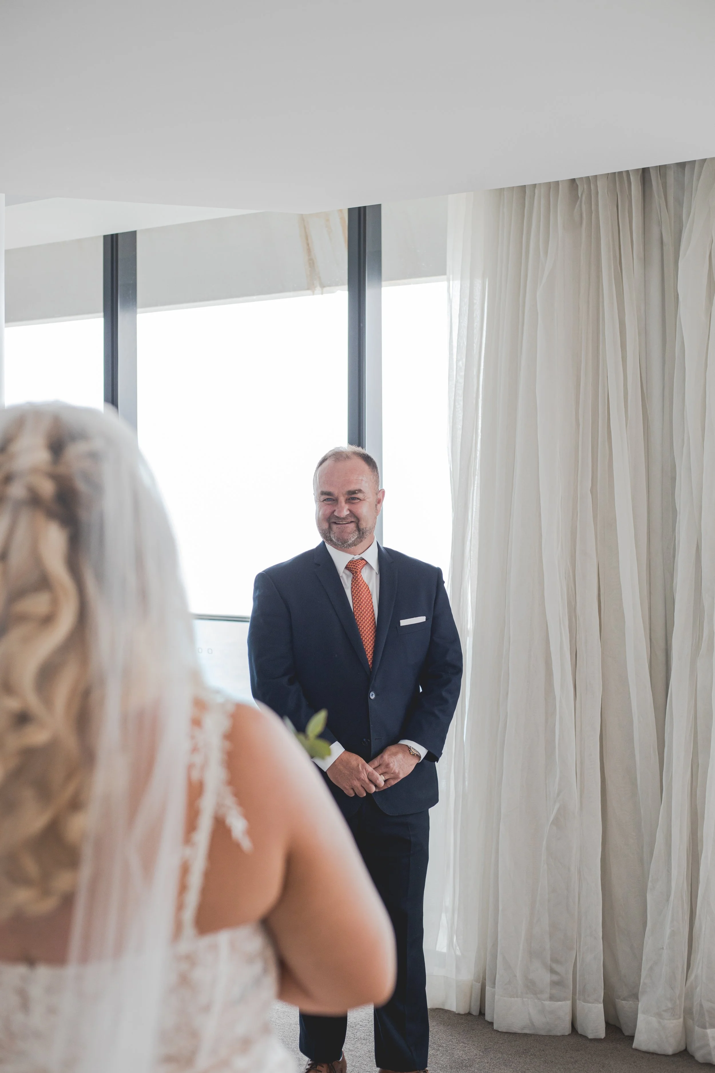 Dads first look of daughter in wedding dress at Peppers Broadbeach.