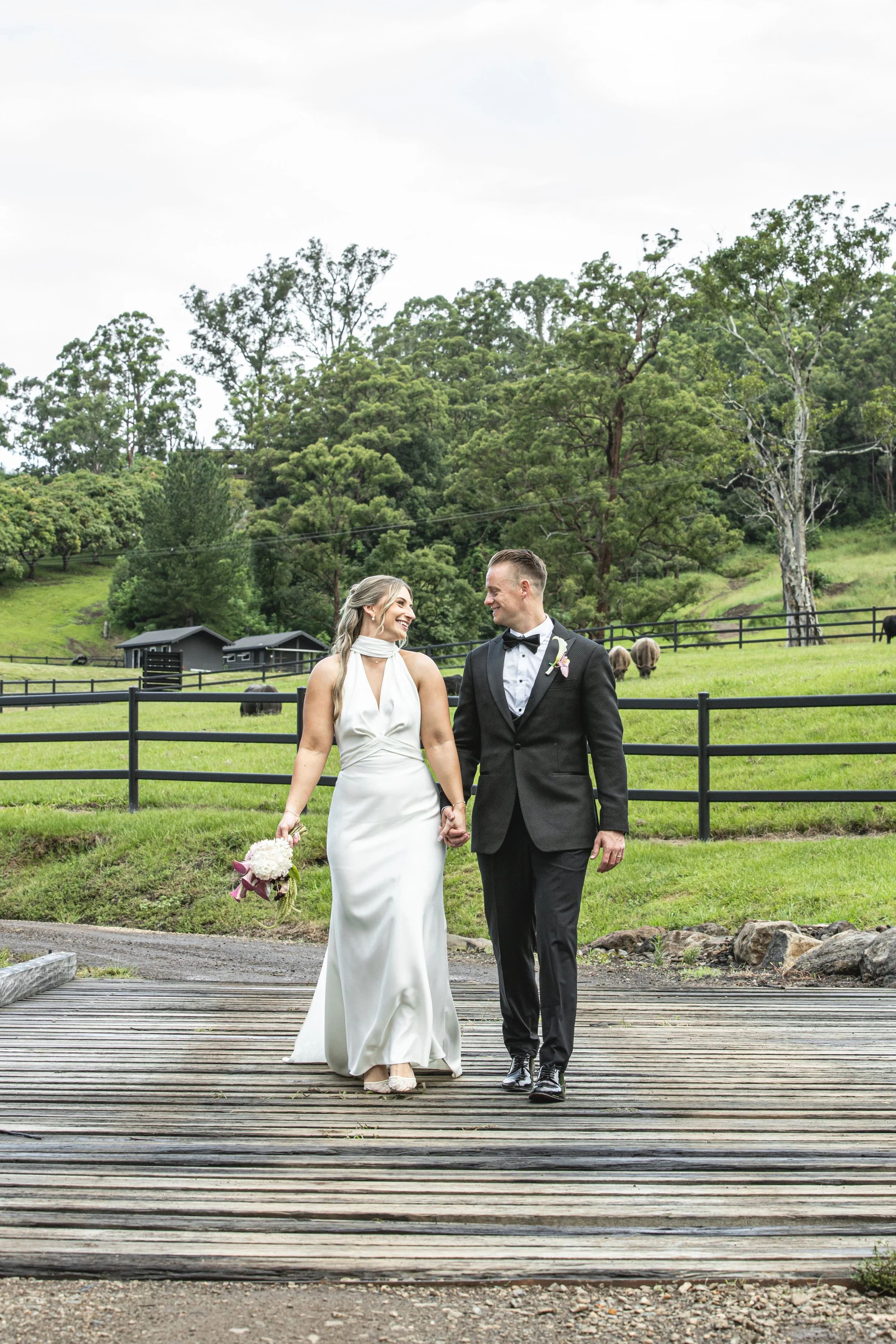 Couple admiring each other at Selah Valley Estate after getting married. 