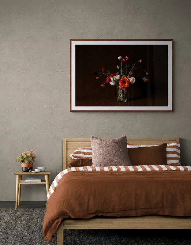 comfy-bedroom-with-wooden-bed-and-side-table.jpg