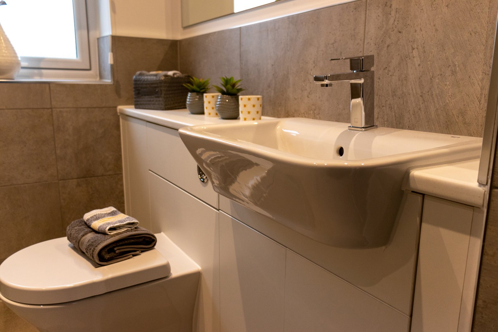 White wall-to-wall bathroom unit.