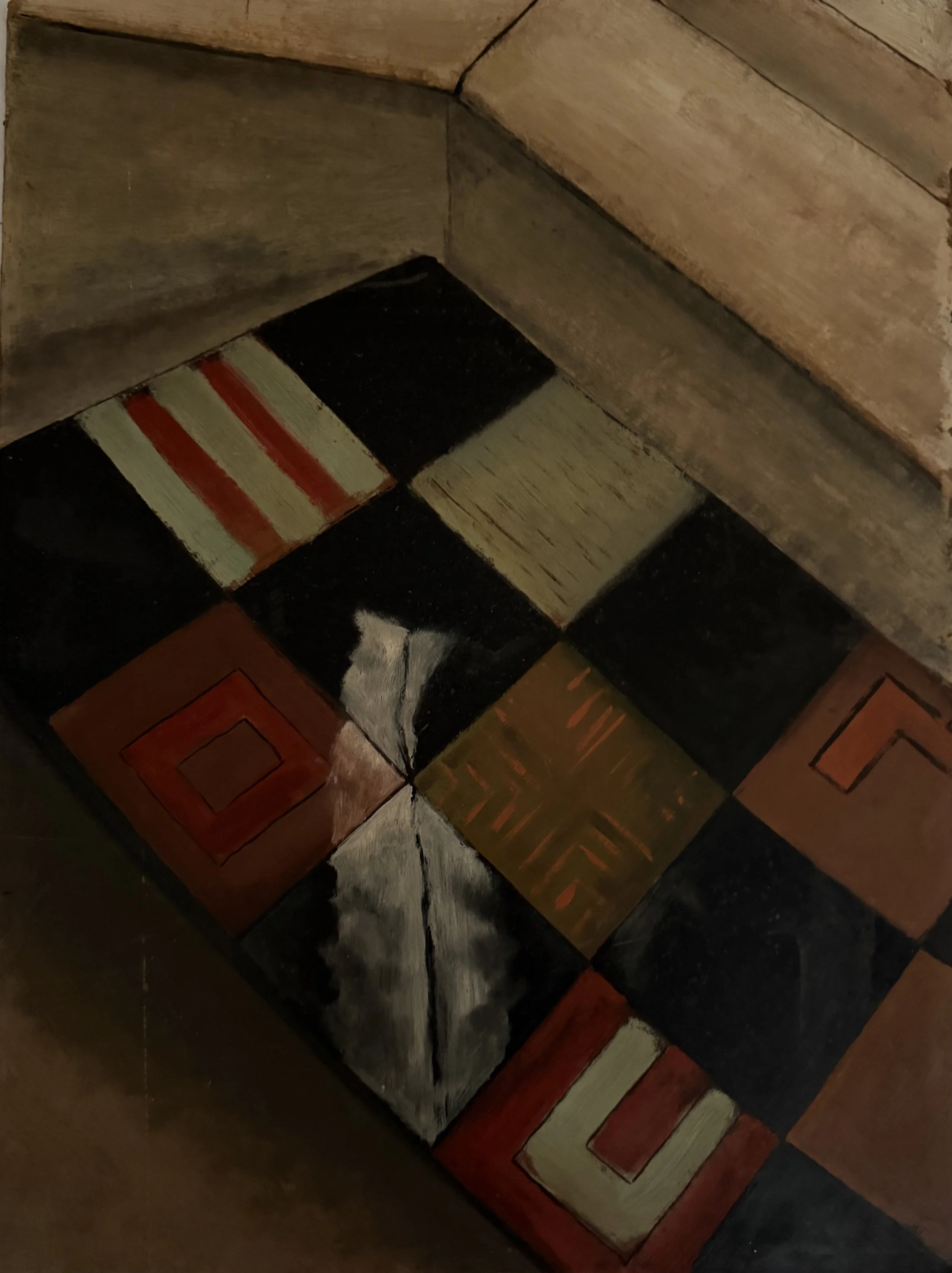 Close-up of a painted wooden staircase with geometric patterns and various colors including black, white, red, and beige.