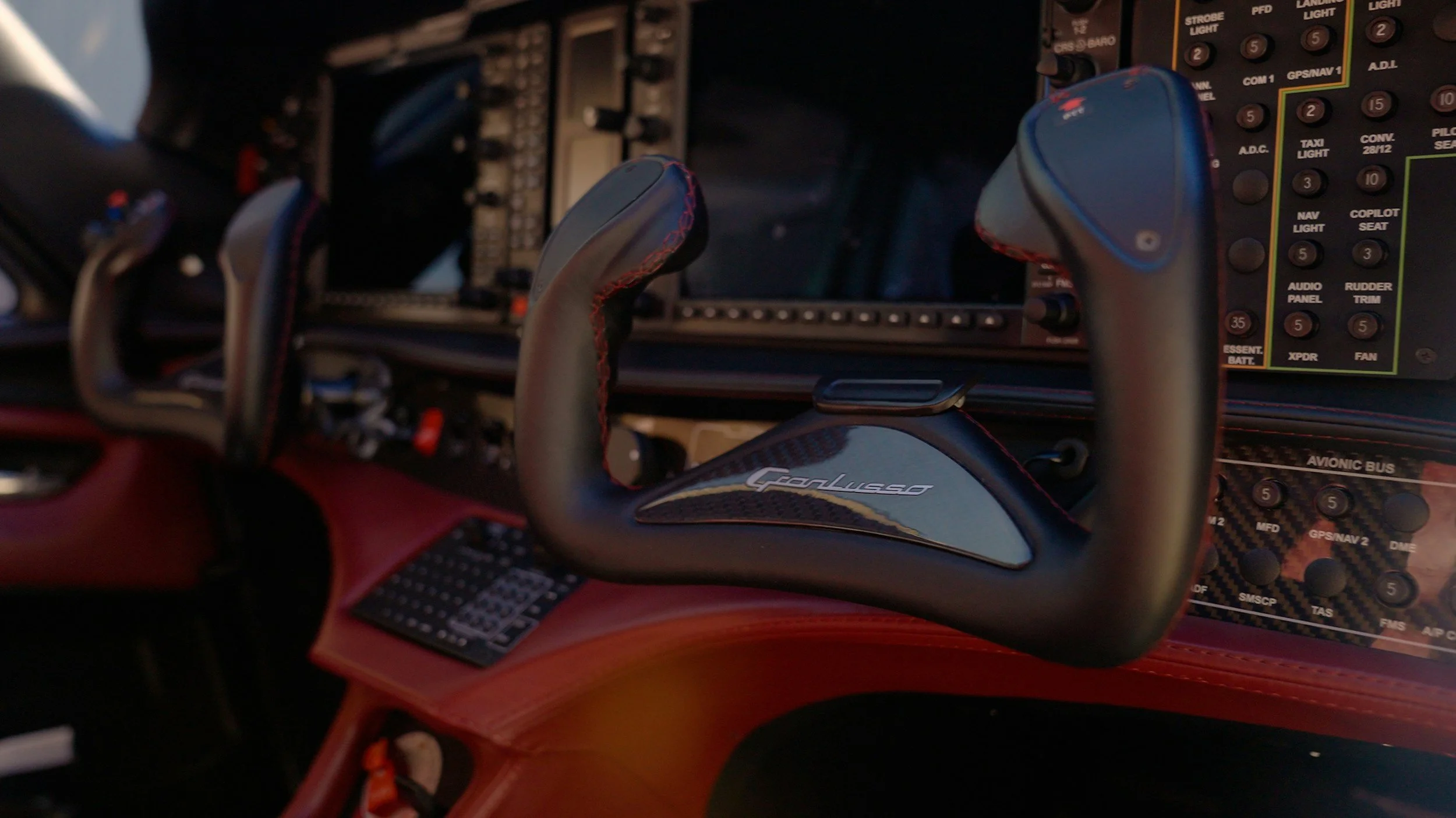 Close-up view of corporate private jet flight deck controls highlighting meticulous aircraft cabin detailing services.