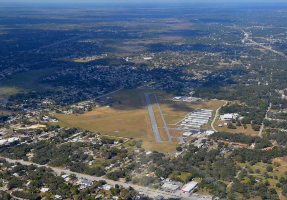 ⁠Aerial view of Arthur Dunn Airpark (X21) in Titusville, providing local private aircraft with professional mobile flight line care.⁠