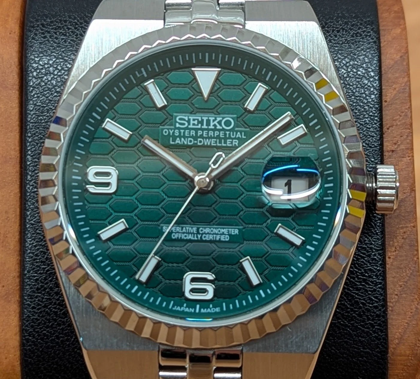 Land Dweller seiko mod honeycomb dial green blue white silver fluted bezel polished integrated bracelet