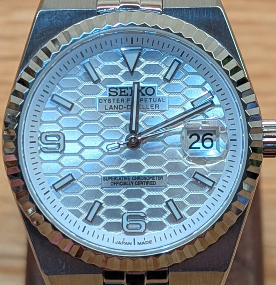 Land Dweller seiko mod honeycomb dial green blue white silver fluted bezel polished integrated bracelet