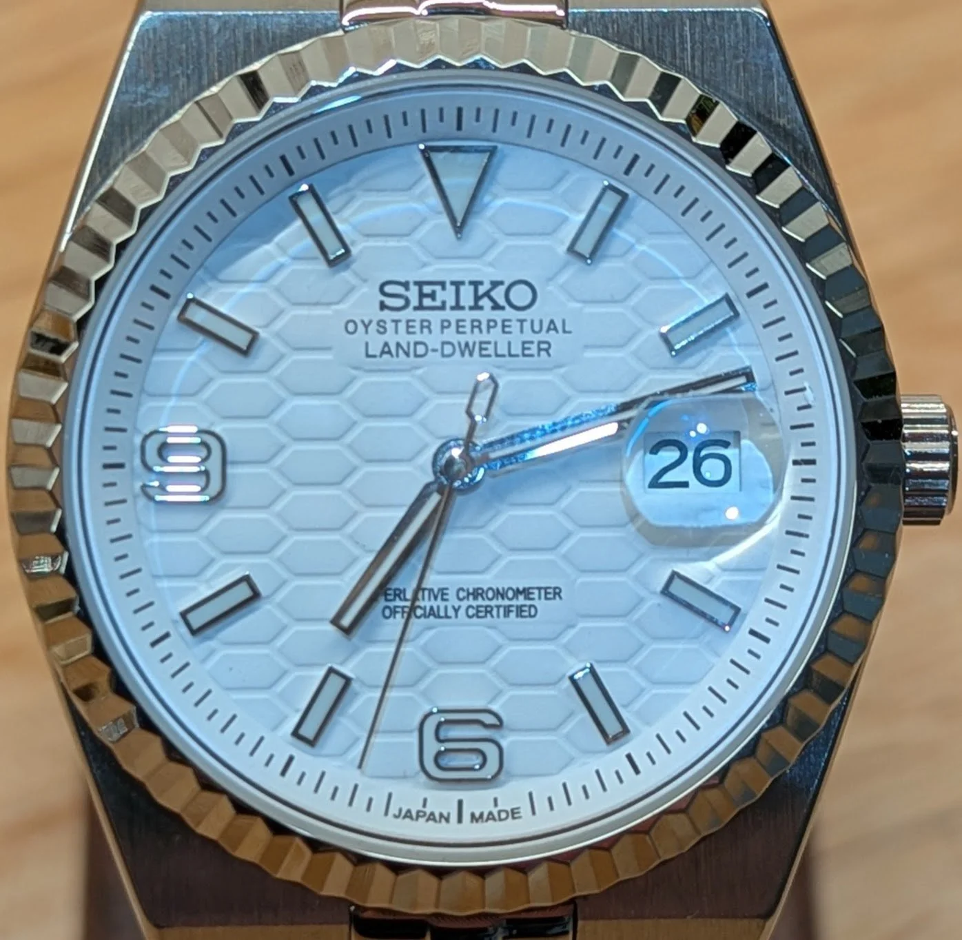 Land Dweller seiko mod honeycomb dial green blue white silver fluted bezel polished integrated bracelet