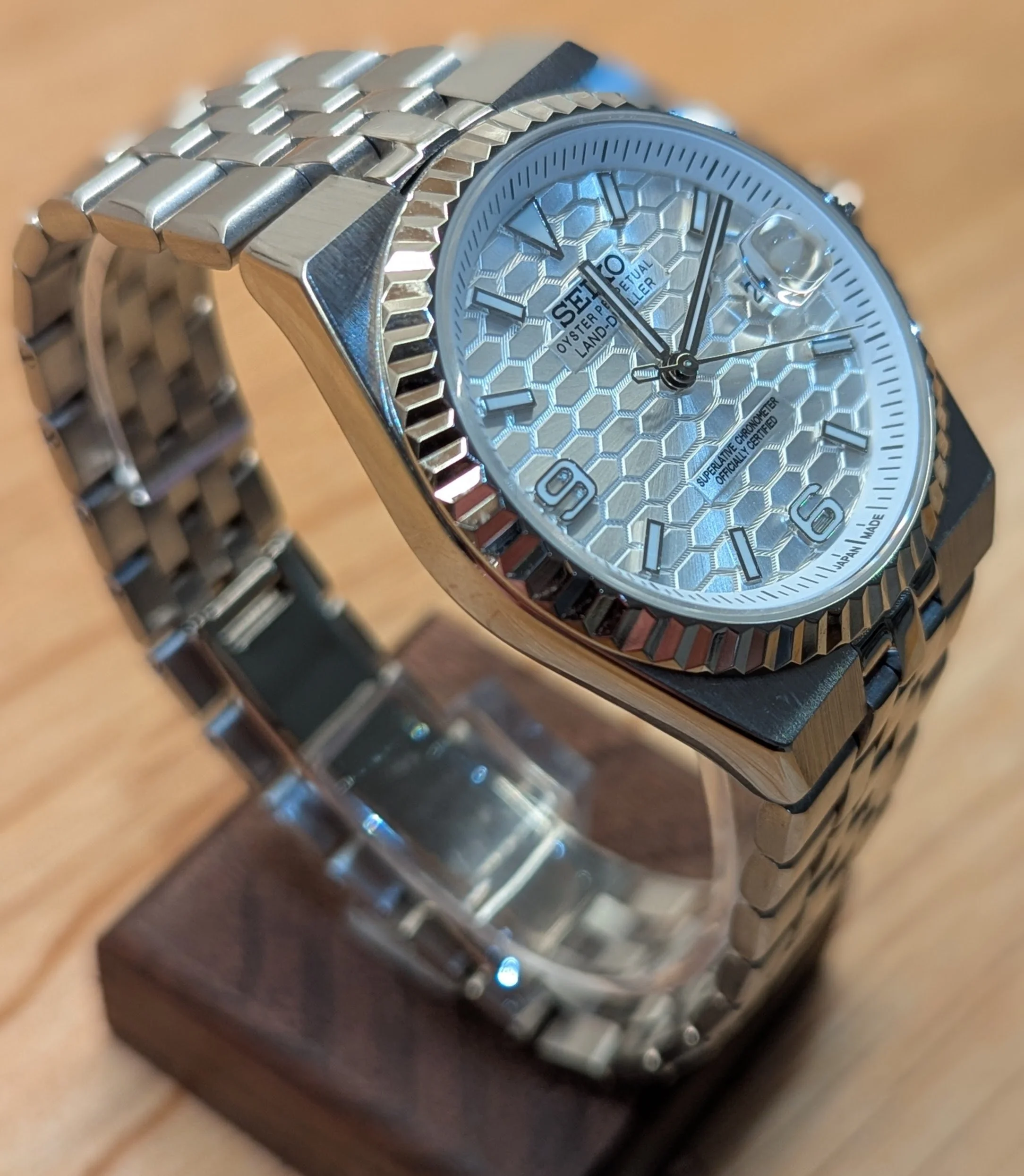 Land Dweller seiko mod honeycomb dial green blue white silver fluted bezel polished integrated bracelet