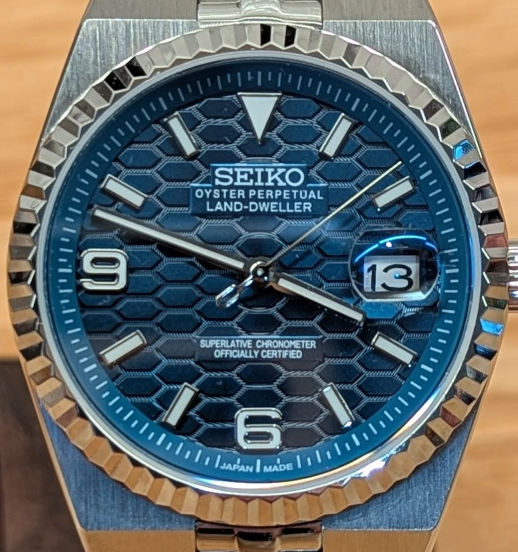 Land Dweller seiko mod honeycomb dial green blue white silver fluted bezel polished integrated bracelet