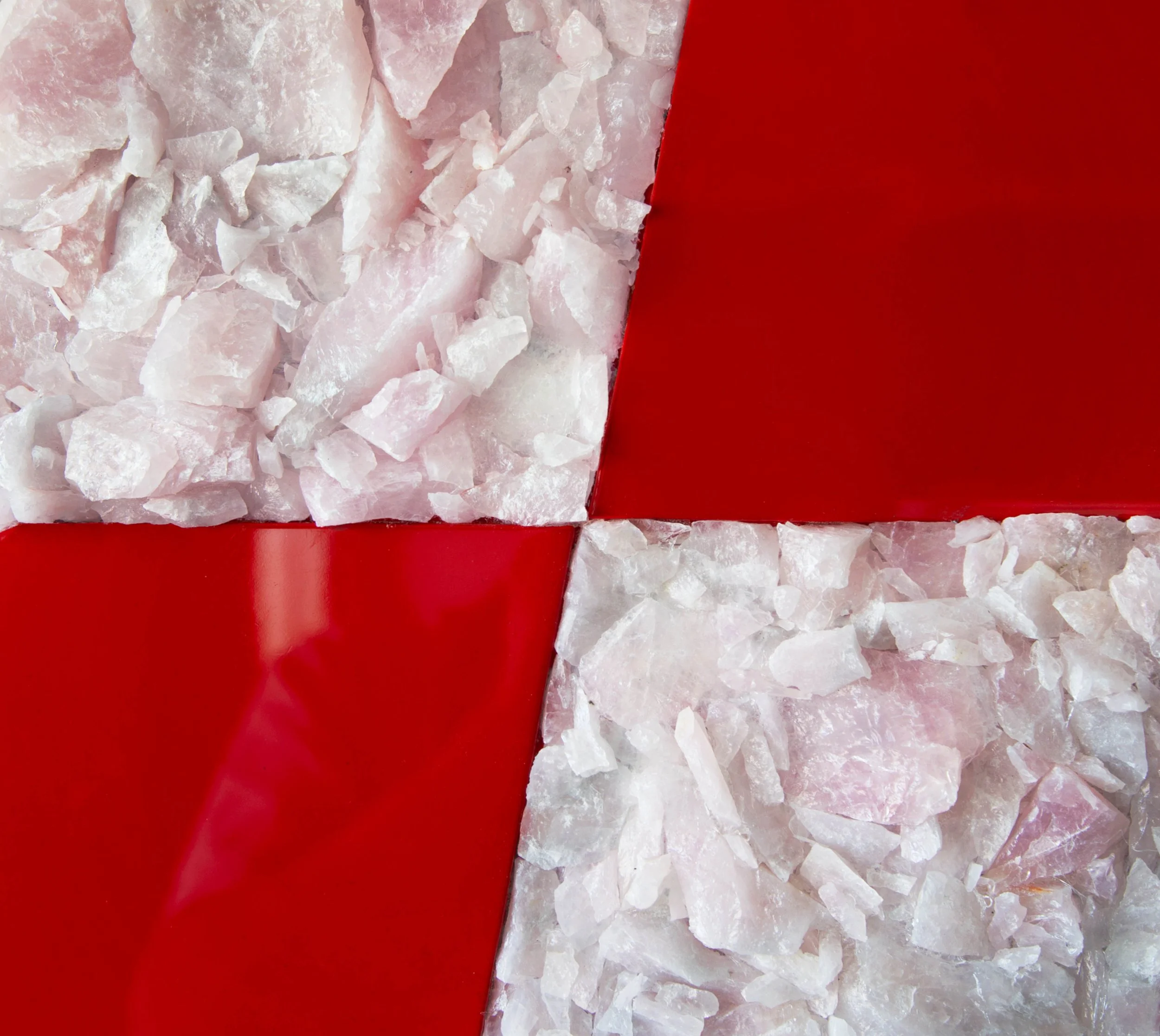Are we well yet, 2022. 30x30x10xm. Rose quartz and racing red paint, high gloss polish on MDF