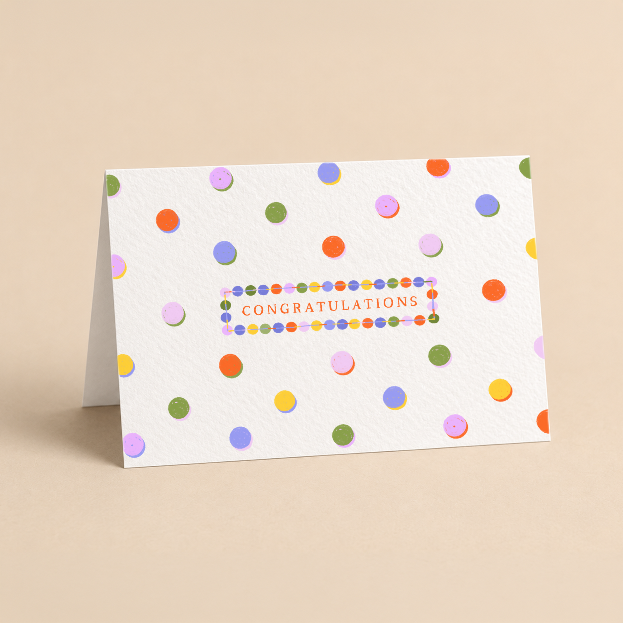 Landscape greeting card featuring festive colorful polka dots and the text Congratulations, original celebratory illustration by Kadna Anda