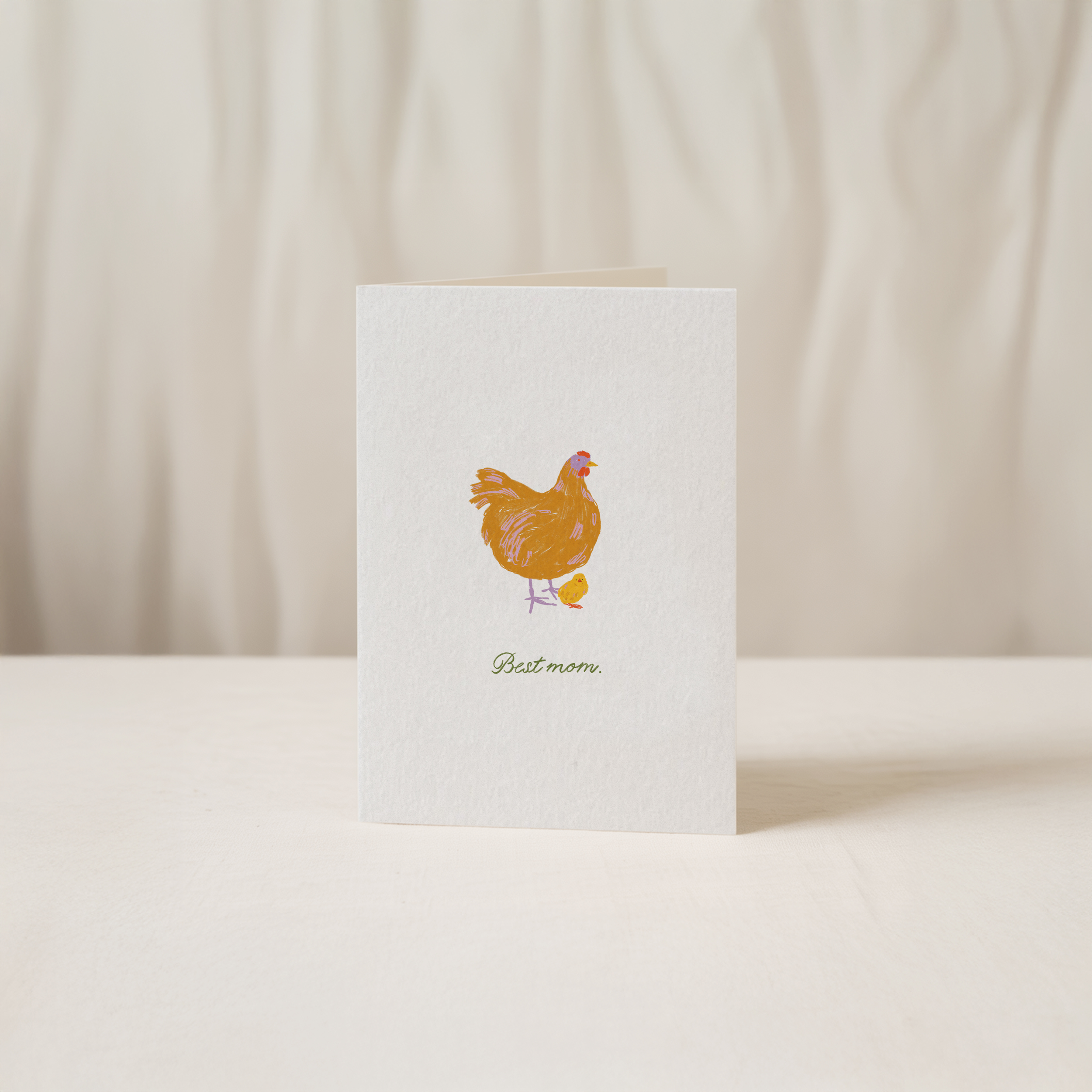 Heartwarming greeting card featuring an adorable illustration of a mother hen and chick with the text Best mom, original Mother's Day art by Kadna Anda