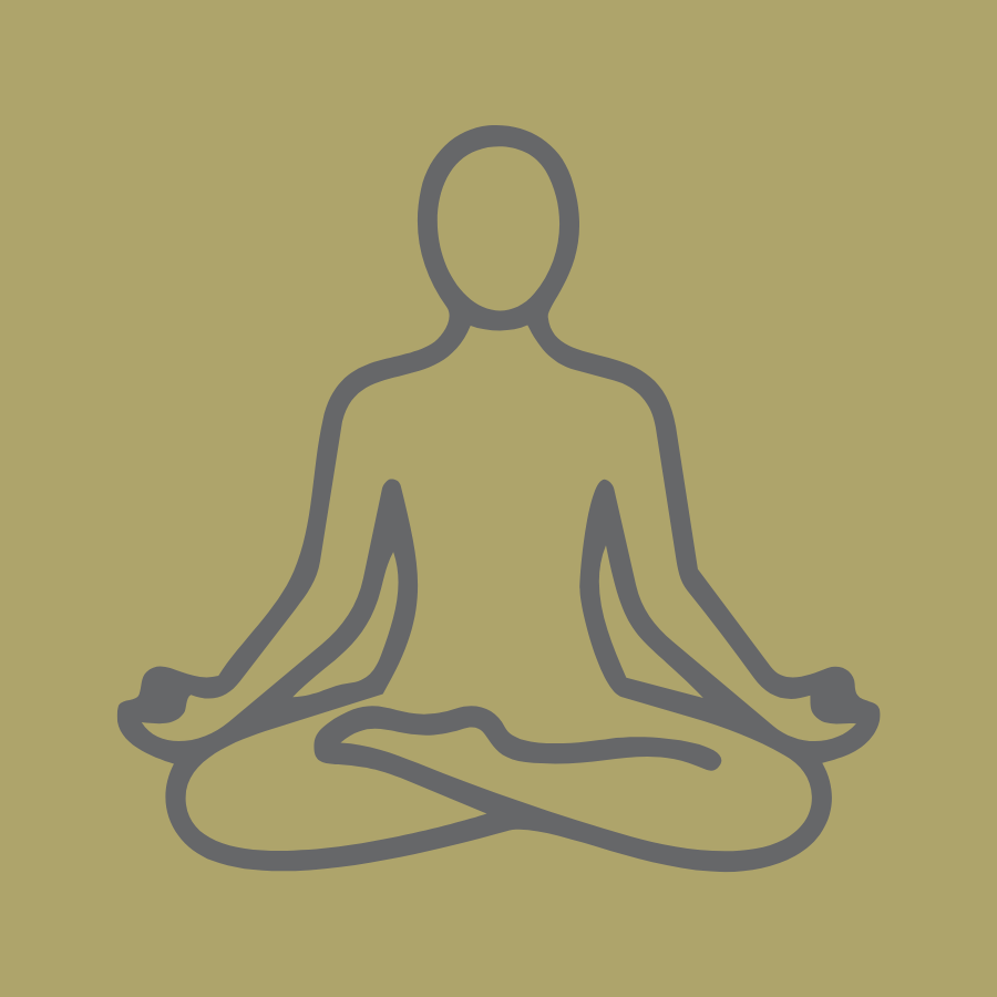 A woman practicing meditation in a seated yoga pose, with eyes closed and hands resting on knees, on a plain background.