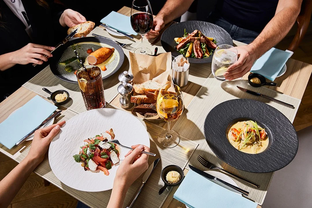 cropped-view-of-people-eating-delicious-food-durin-2026-03-12-23-49-19-utc.jpg