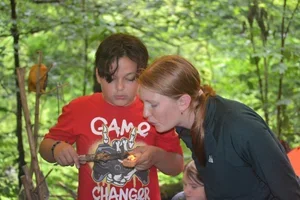 Antonio+MIlillan+(Montpelier),+and+instructor+Clara+Schwartz+(Waitsfield)+are+practicing+an+ancient+art+of+coal+burningJPG.webp