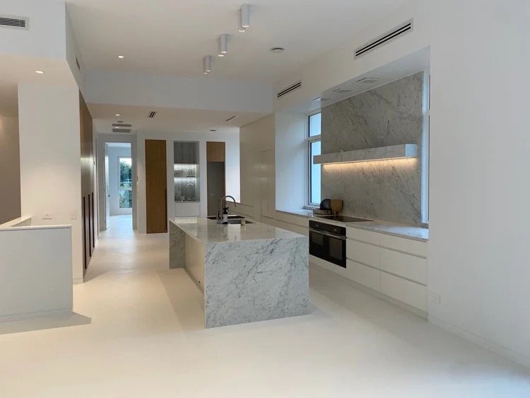 freshly renovated interior kitchen diner using high end materials and natural Italian marble