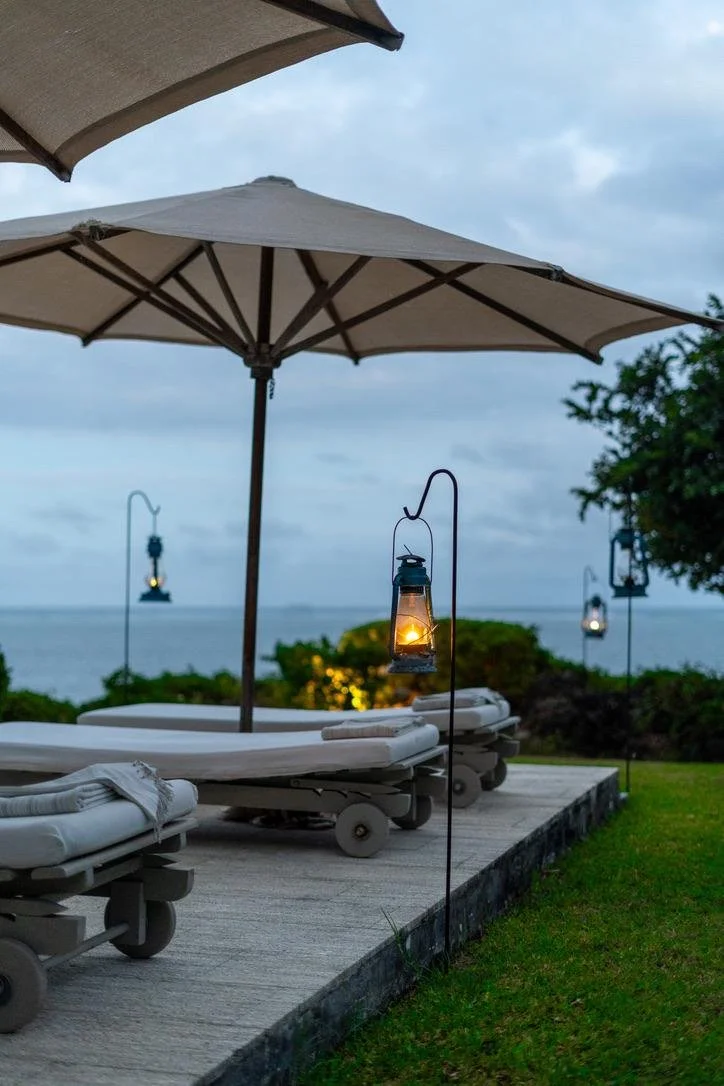 Poolside loungers overlooking the Indian Ocean at Casa Moja in Mombasa, Kenya