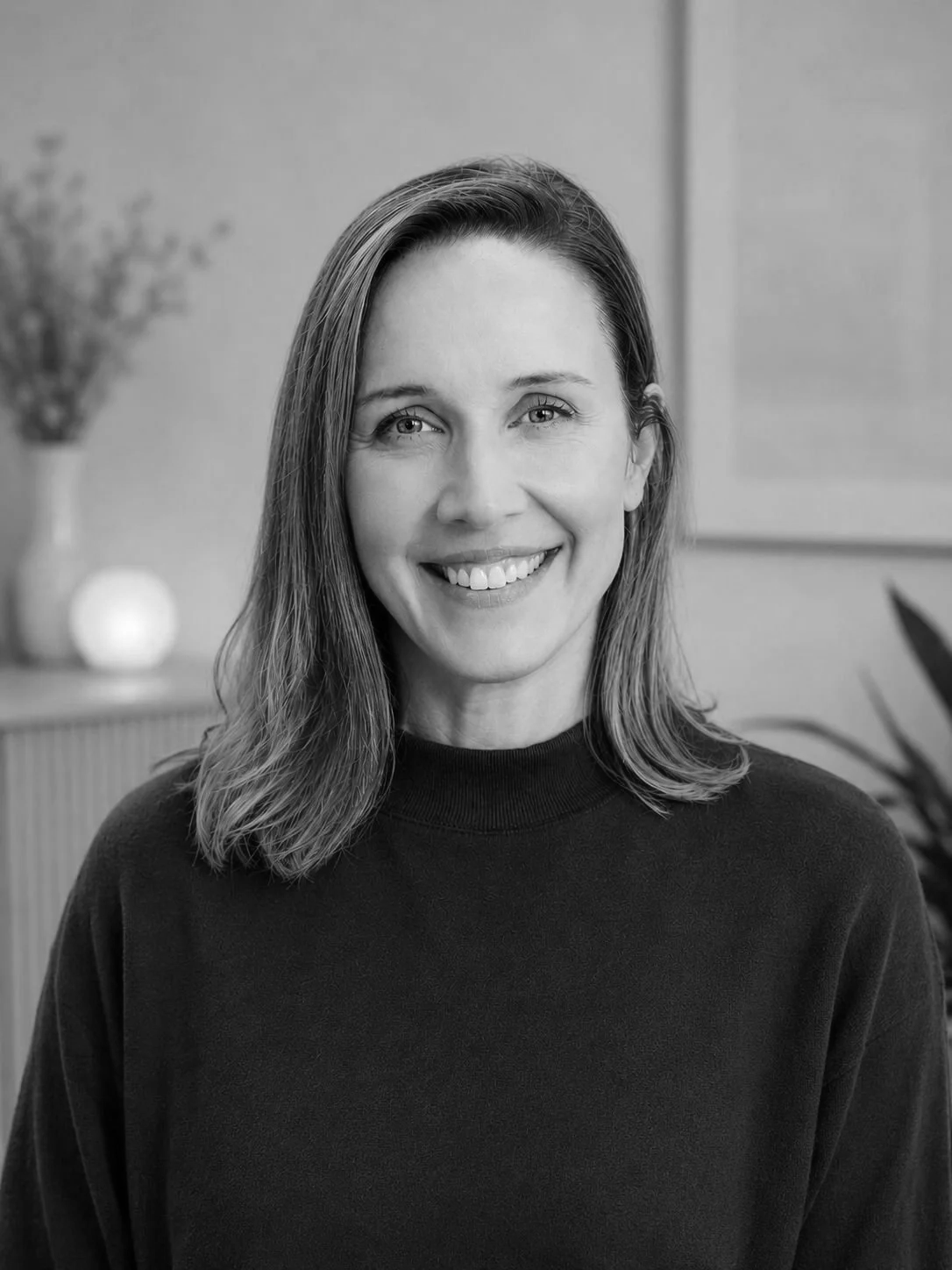 Portrait of Dr. Kate Brunsdon in black and white.