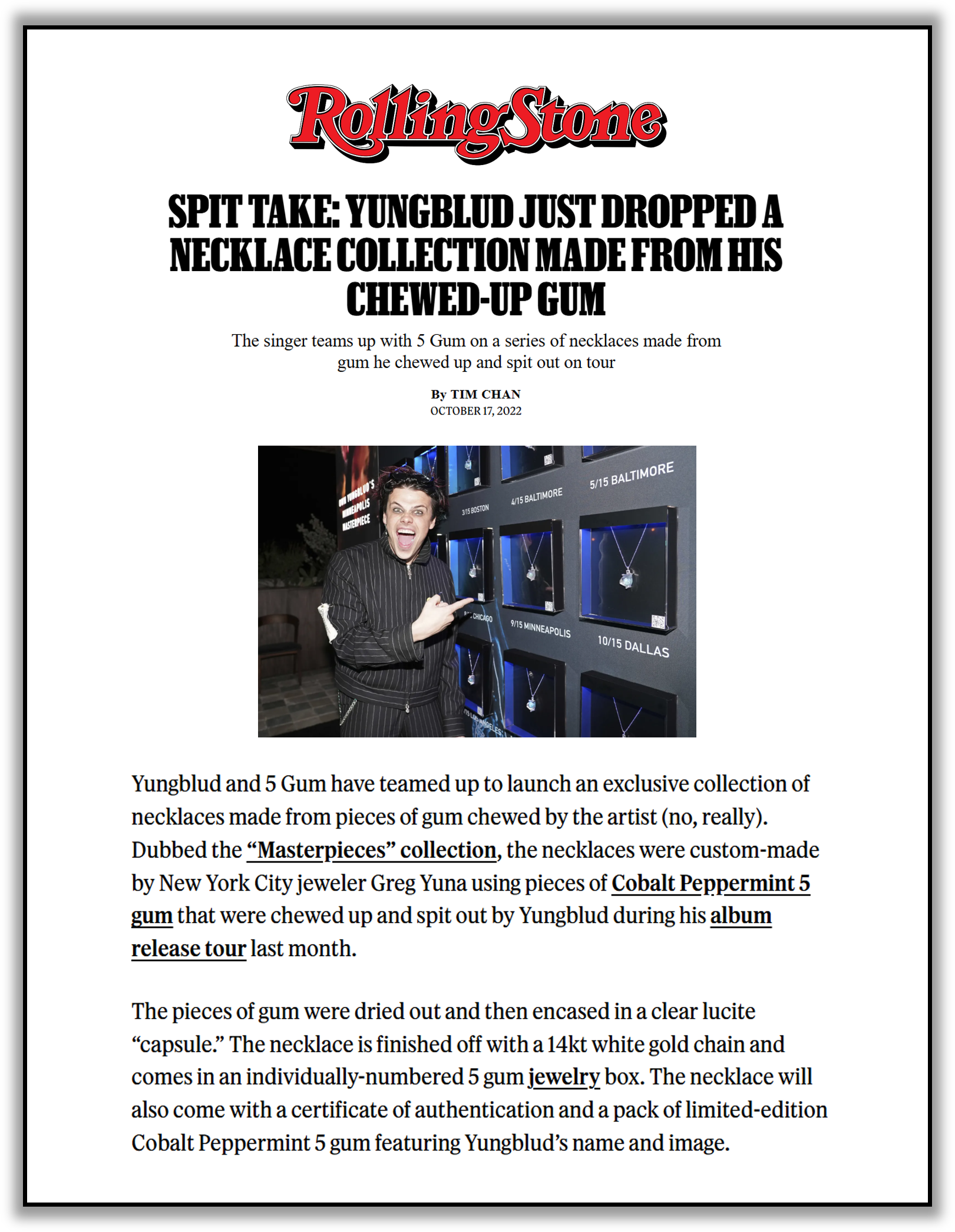 Article page about Yungblud and 5 Gum collaborating on necklace collection made from chewed gum, featuring a person pointing at necklaces displayed behind glass.