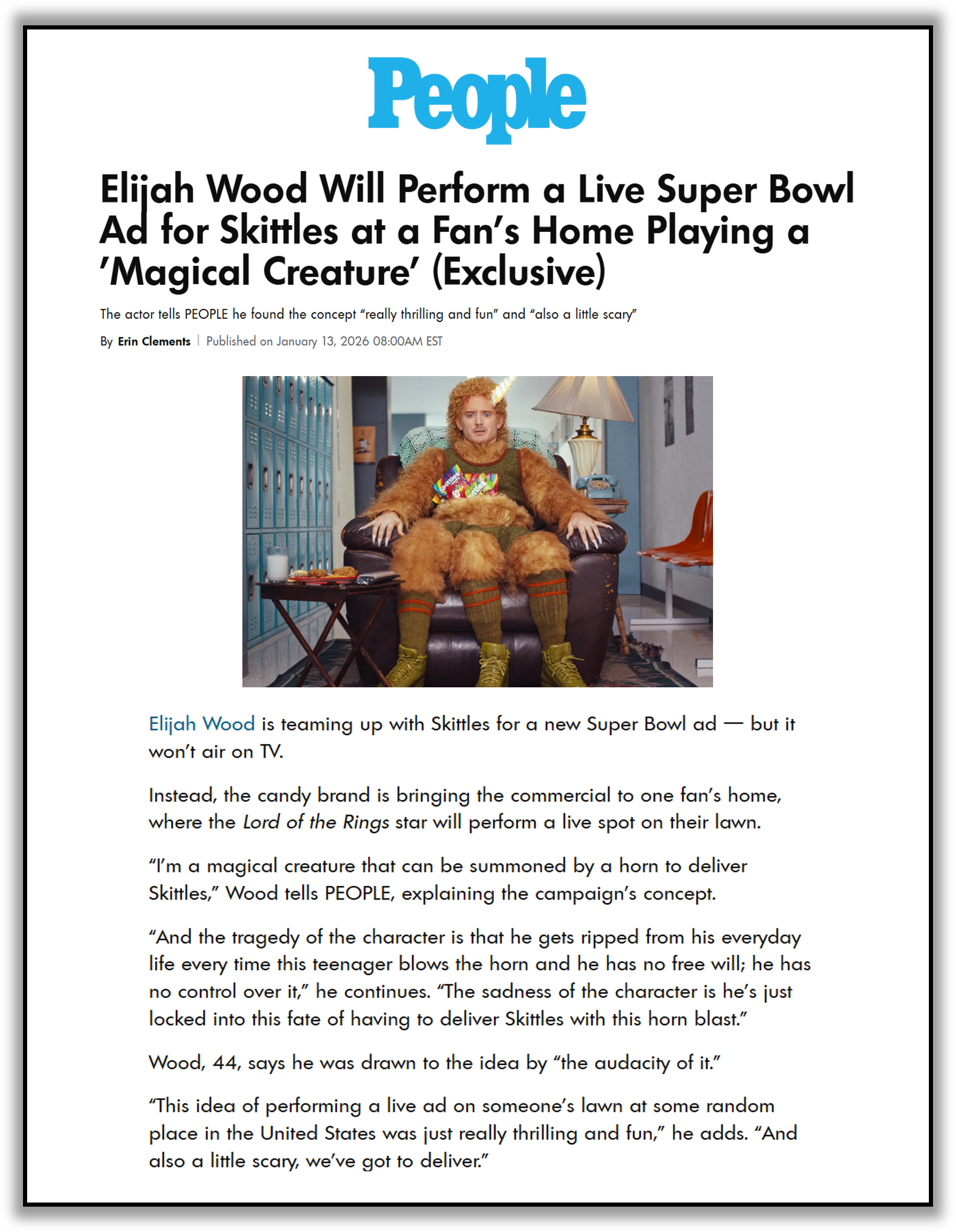 A news article screenshot featuring a scene from a commercial where a man dressed as a furry creature with a horn on his head, sitting in a room with blue lockers and orange chairs, holds Skittles candy.