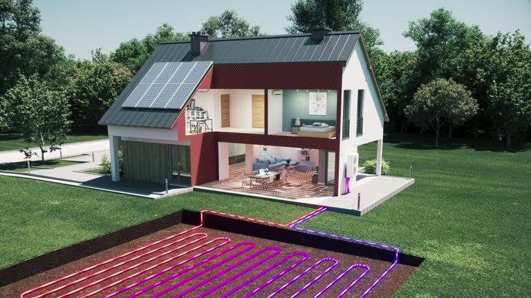 Casa moderna con pannelli solari sul tetto, impianto di riscaldamento a pavimento visibile nel terreno.