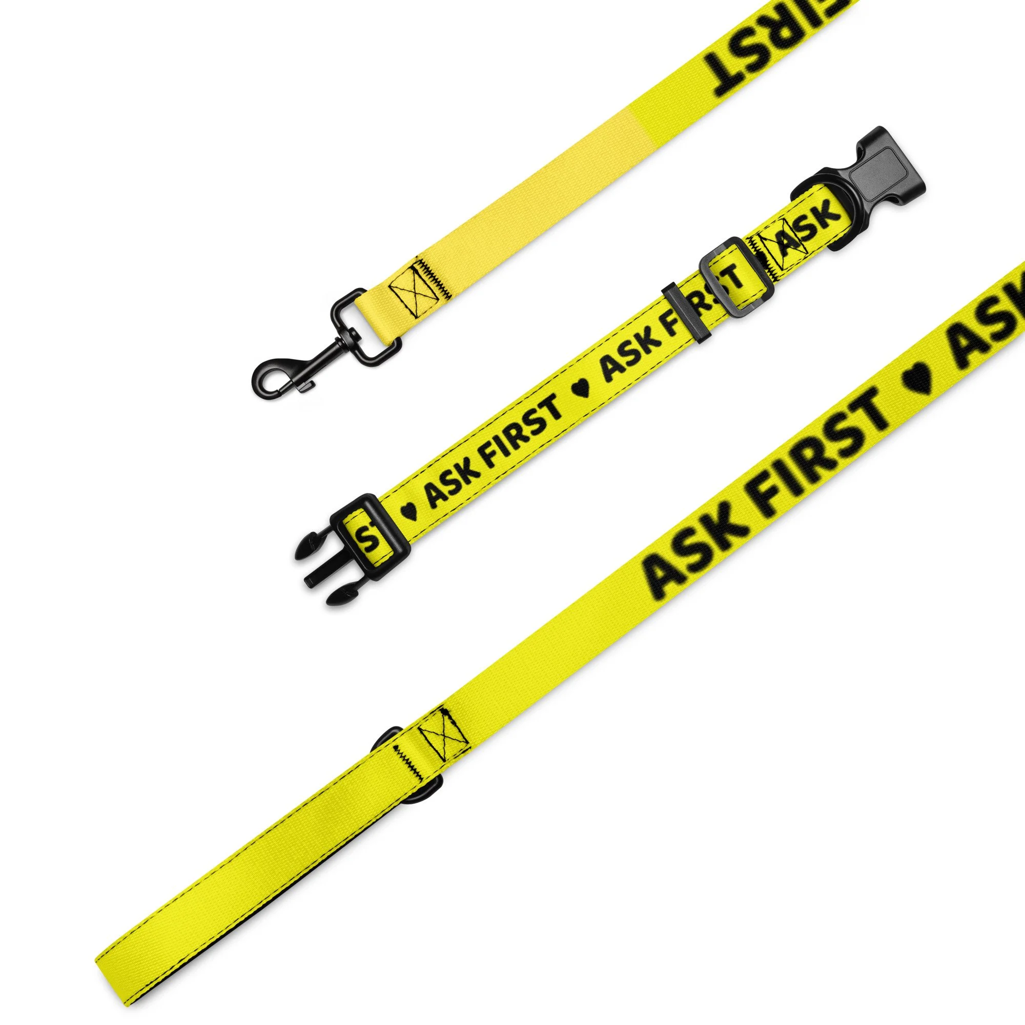 Close-up of the yellow ASK FIRST leash webbing and metal snap hook