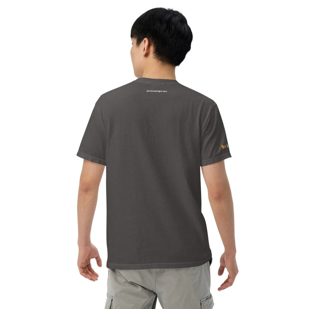 Man wearing a dark gray heavyweight tee with dichiaradesigns.com on the back top
