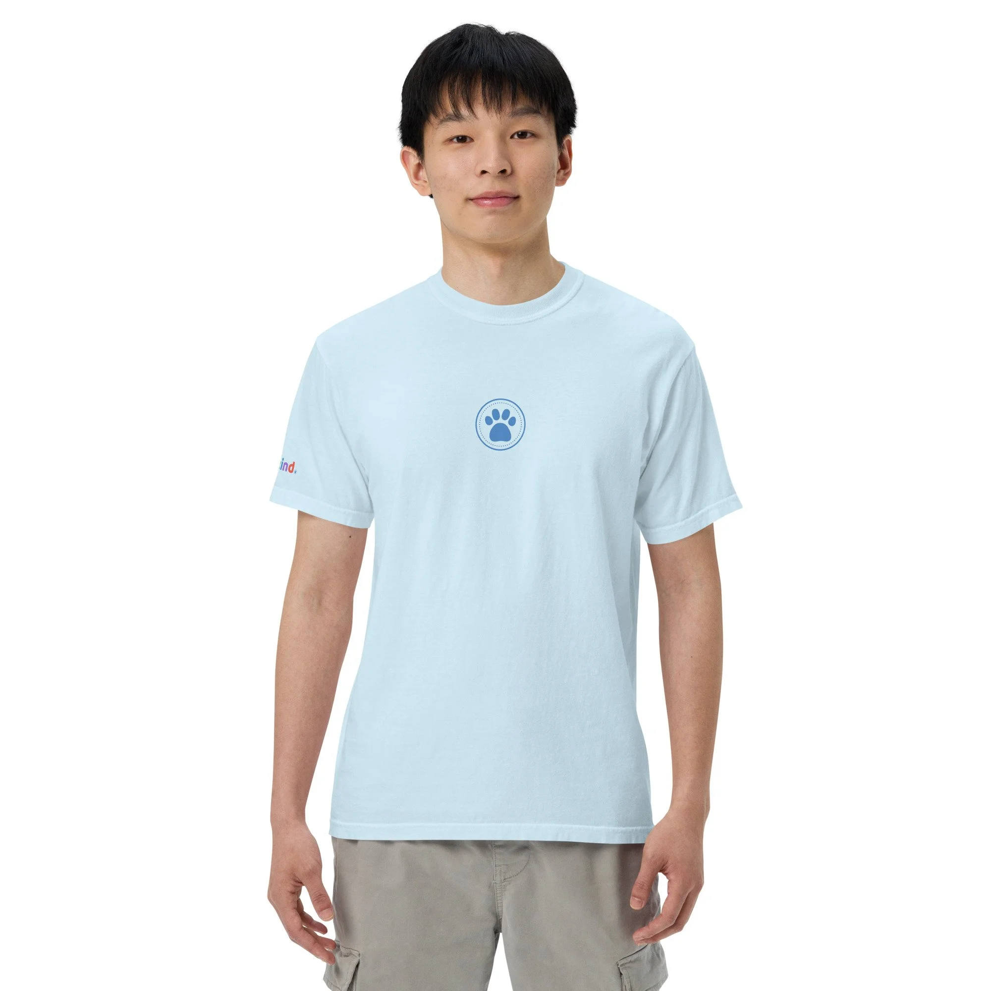 Man wearing a light blue heavyweight tee with the blue paw print on the chest