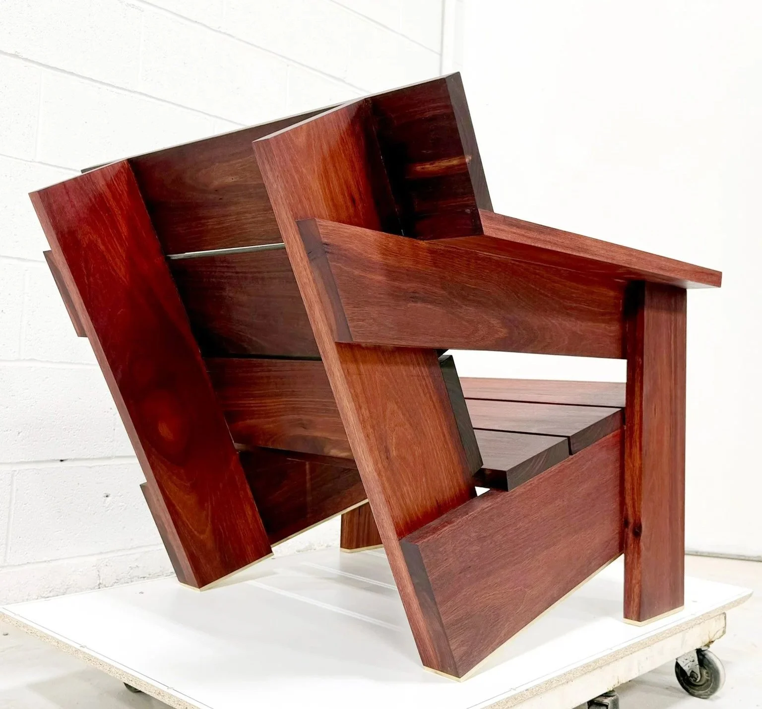 PORT CHAIR 

Constructed from solid hardwoods with handcrafted joinery, a penetrating oil finish, and solid brass feet. Designed to weather gracefully indoors or out.
Shown: Jarrah with solid brass feet

Dimensions: 29" W × 35¼" D × 27" H

Made to or