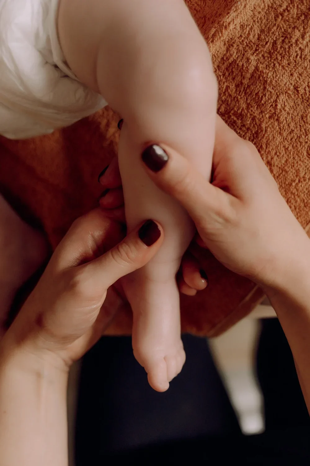 Massaging a baby's leg