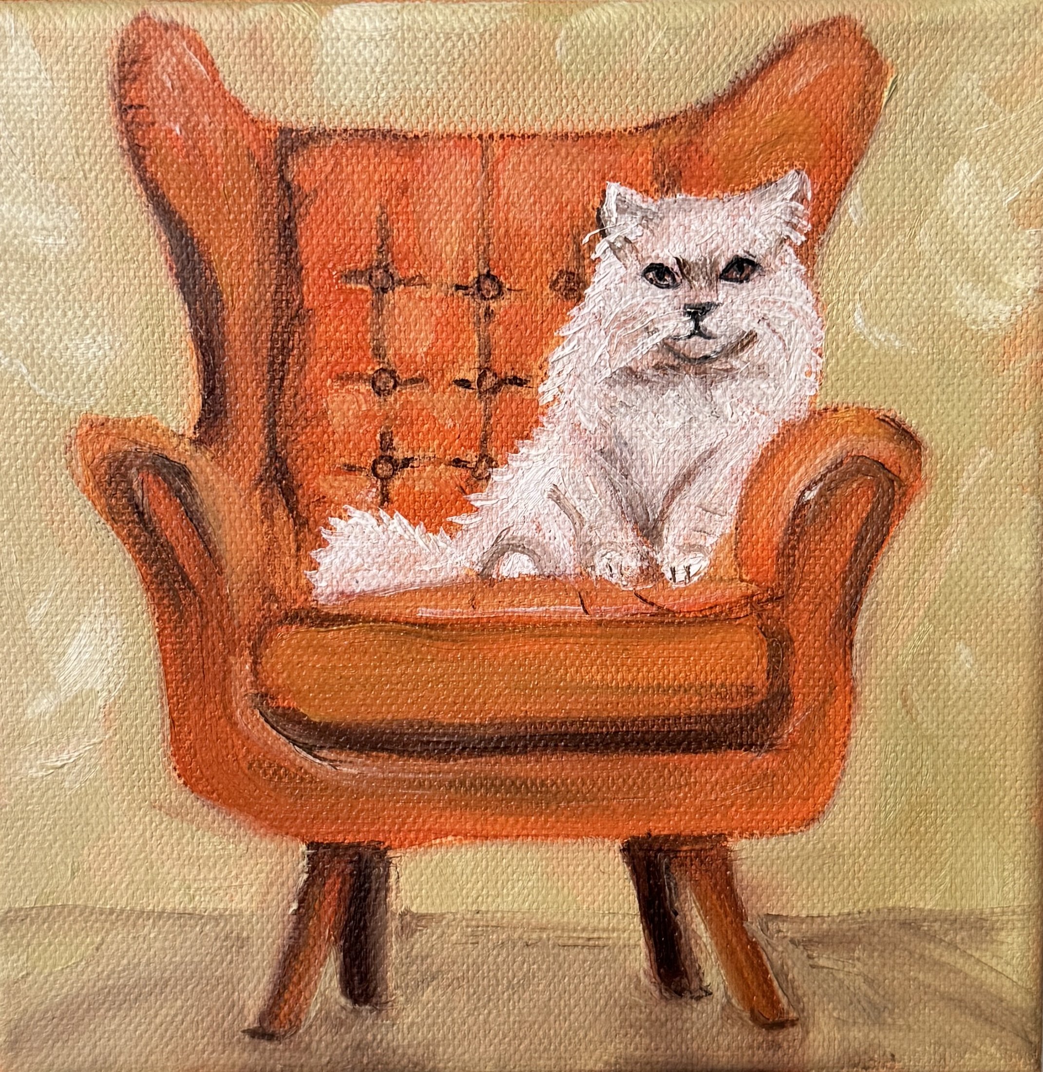 Orange Chair, Oil paint on canvas, 2025. Painting of a white cat on an orange armchair.