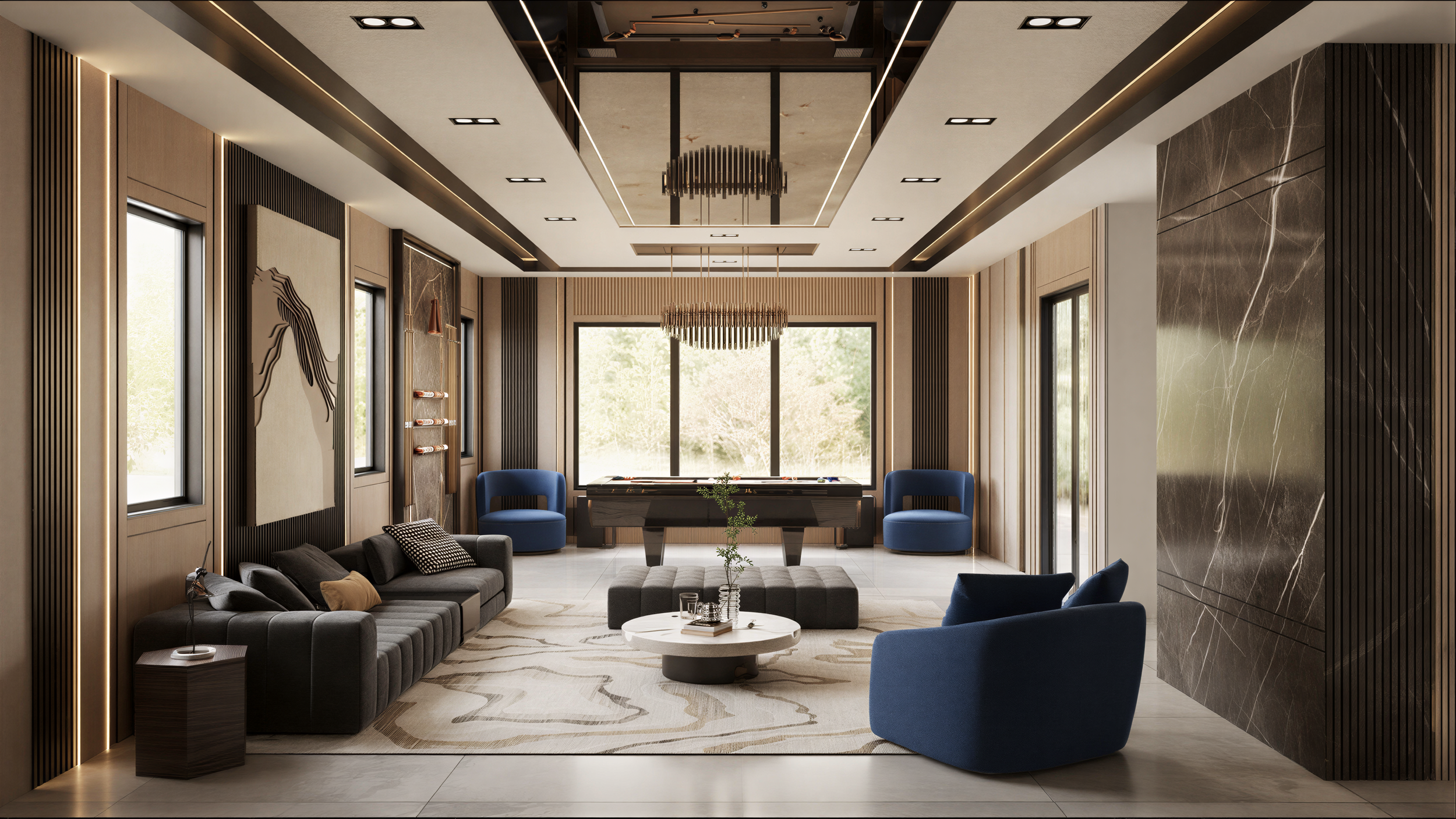 Modern living room with large windows, gray couch, blue chairs, a foosball table, chandelier, and decorative wood and marble walls.