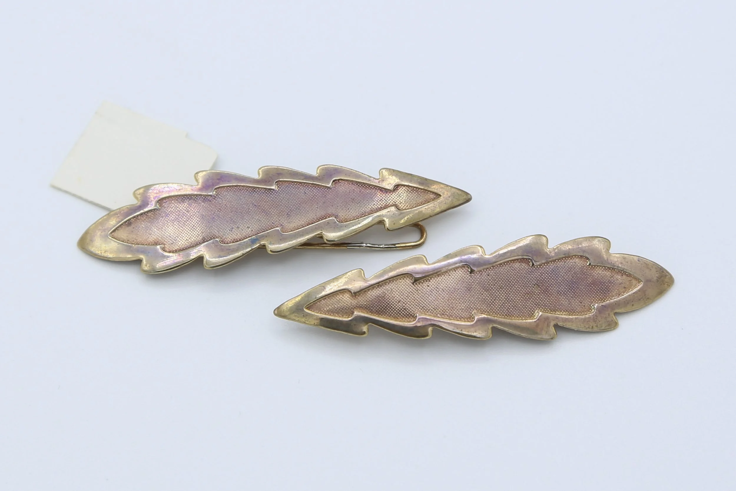 FEATHER BARRETTE PAIR ANTIQUED