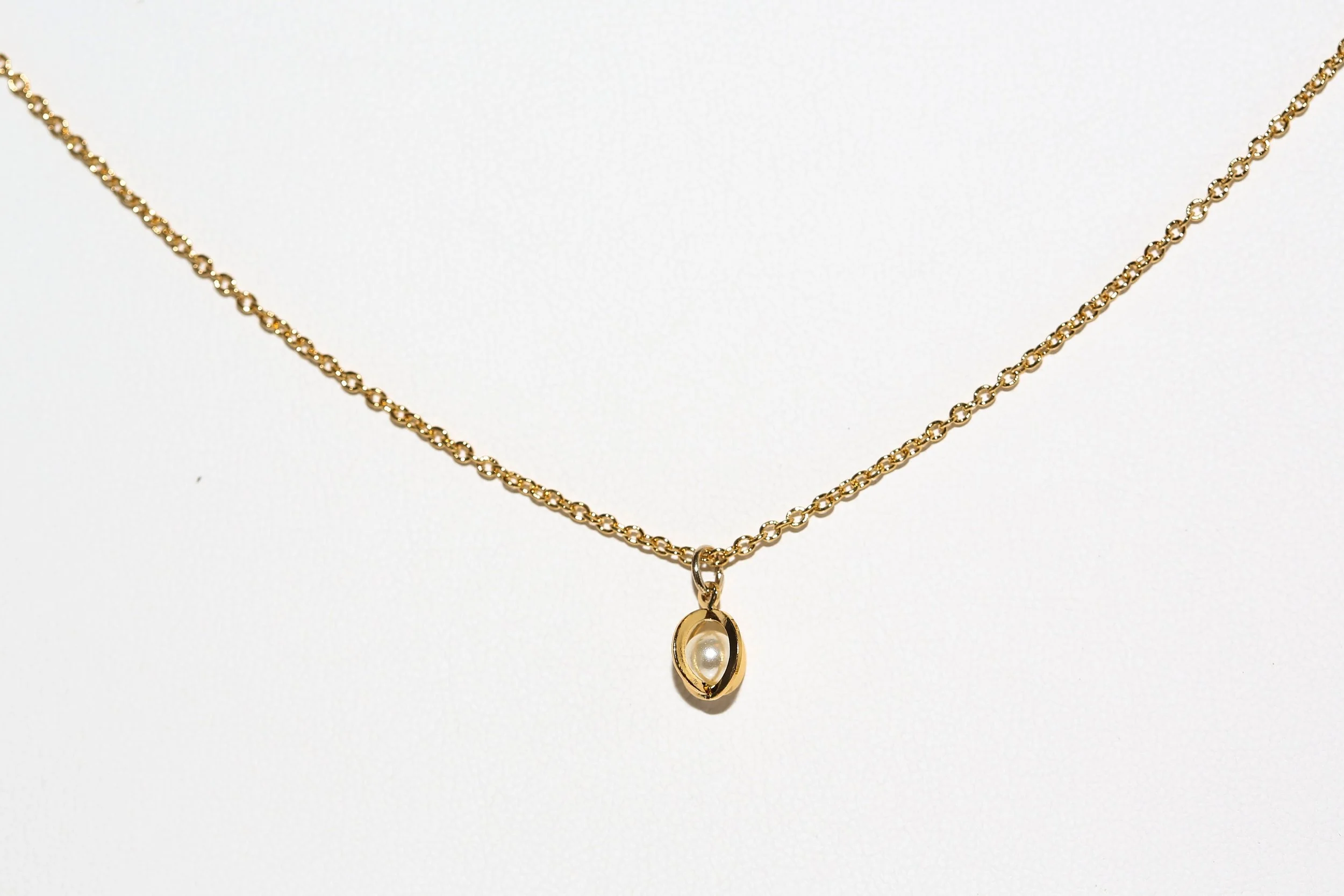 LADY REMINGTON FAUX CAGED PEARL