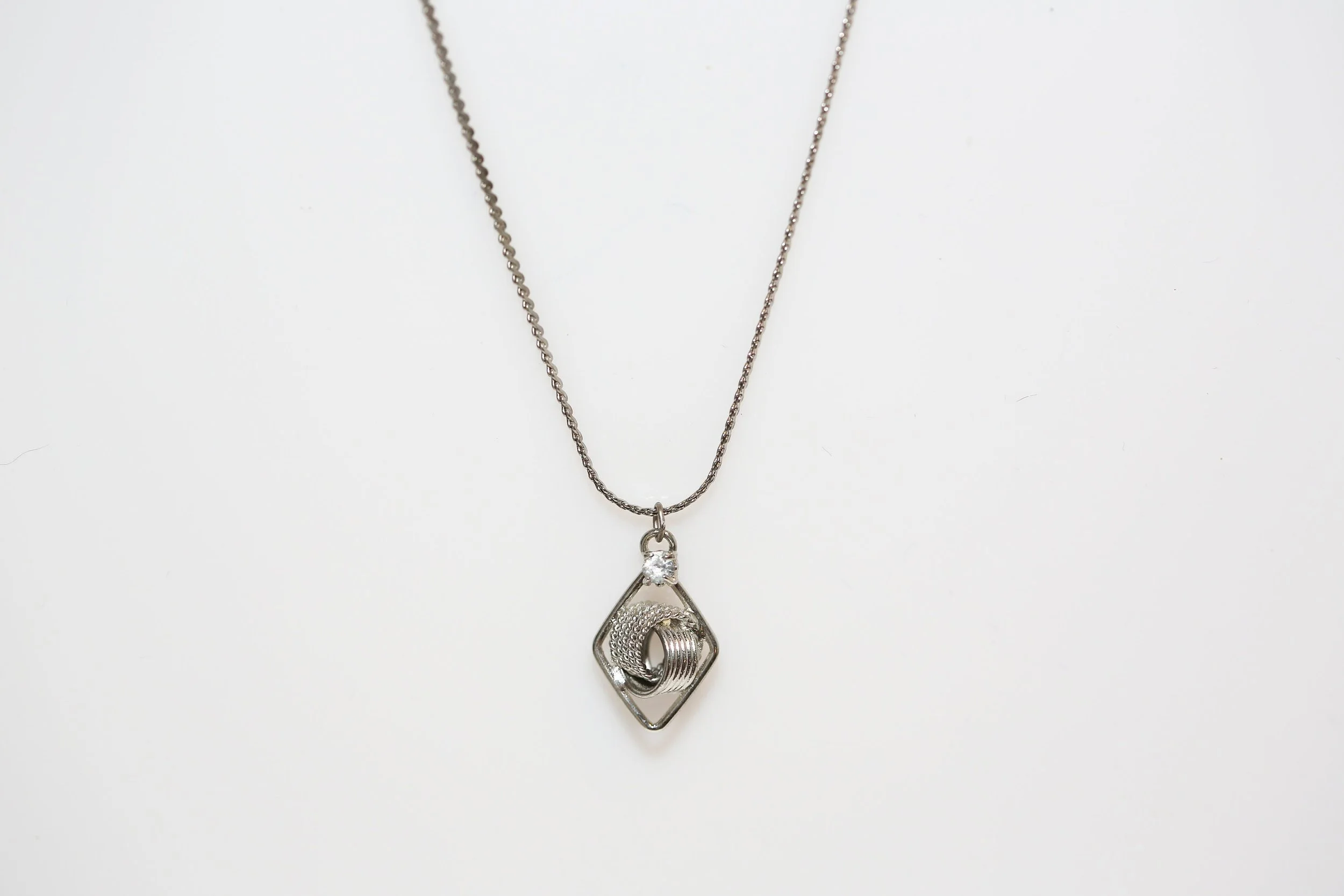 RHINESTONE LOVE KNOT NECKLACE