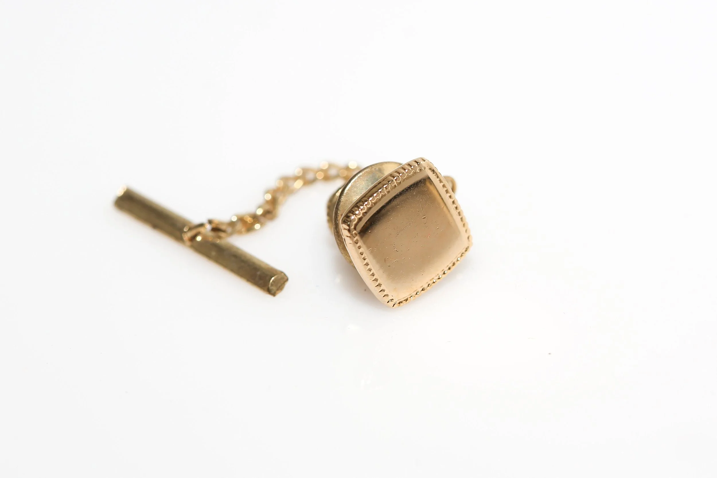SQUARE BORDER TIE TACK