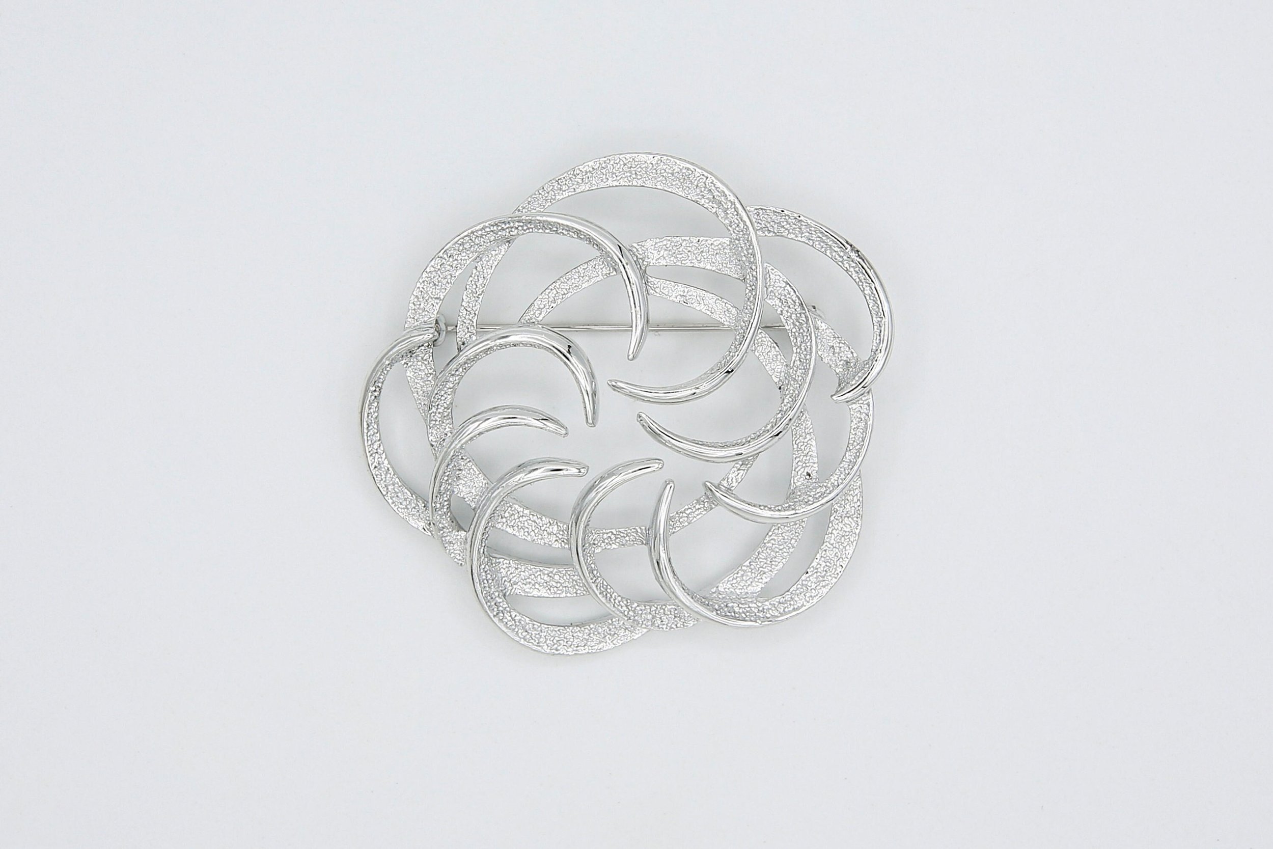 1967 SARAH COVENTRY TAILORED SWIRL PIN