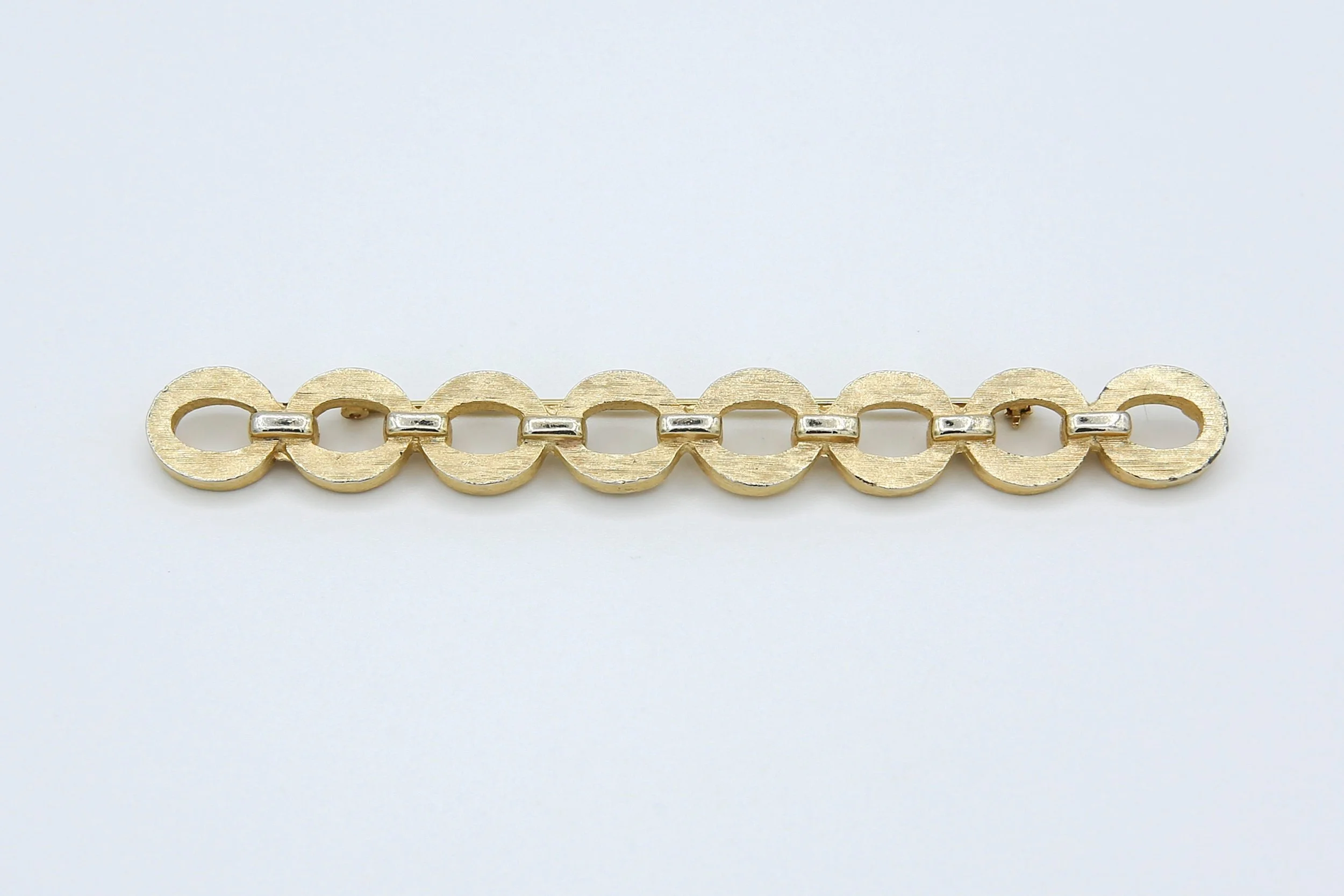 1960 SARAH COVENTRY CHANEL-BAR PIN