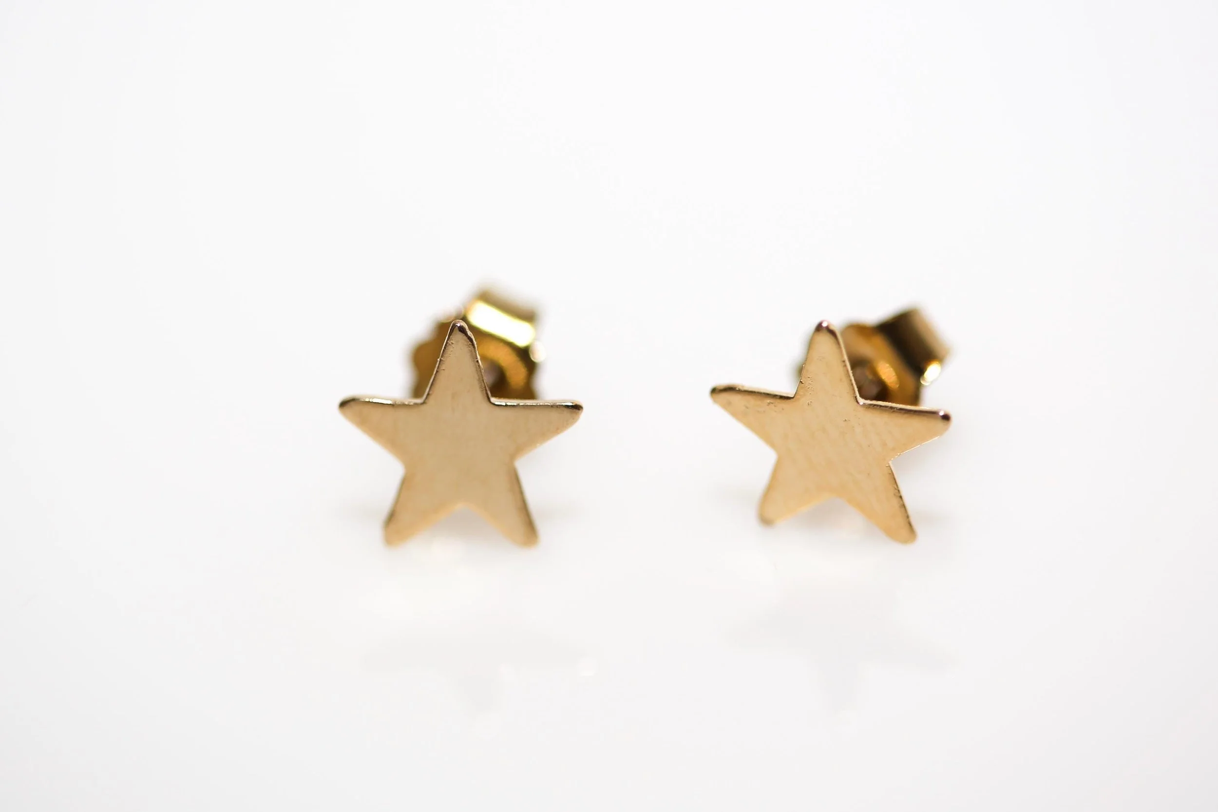 VINTAGE SHINY GOLD STAR STUDS