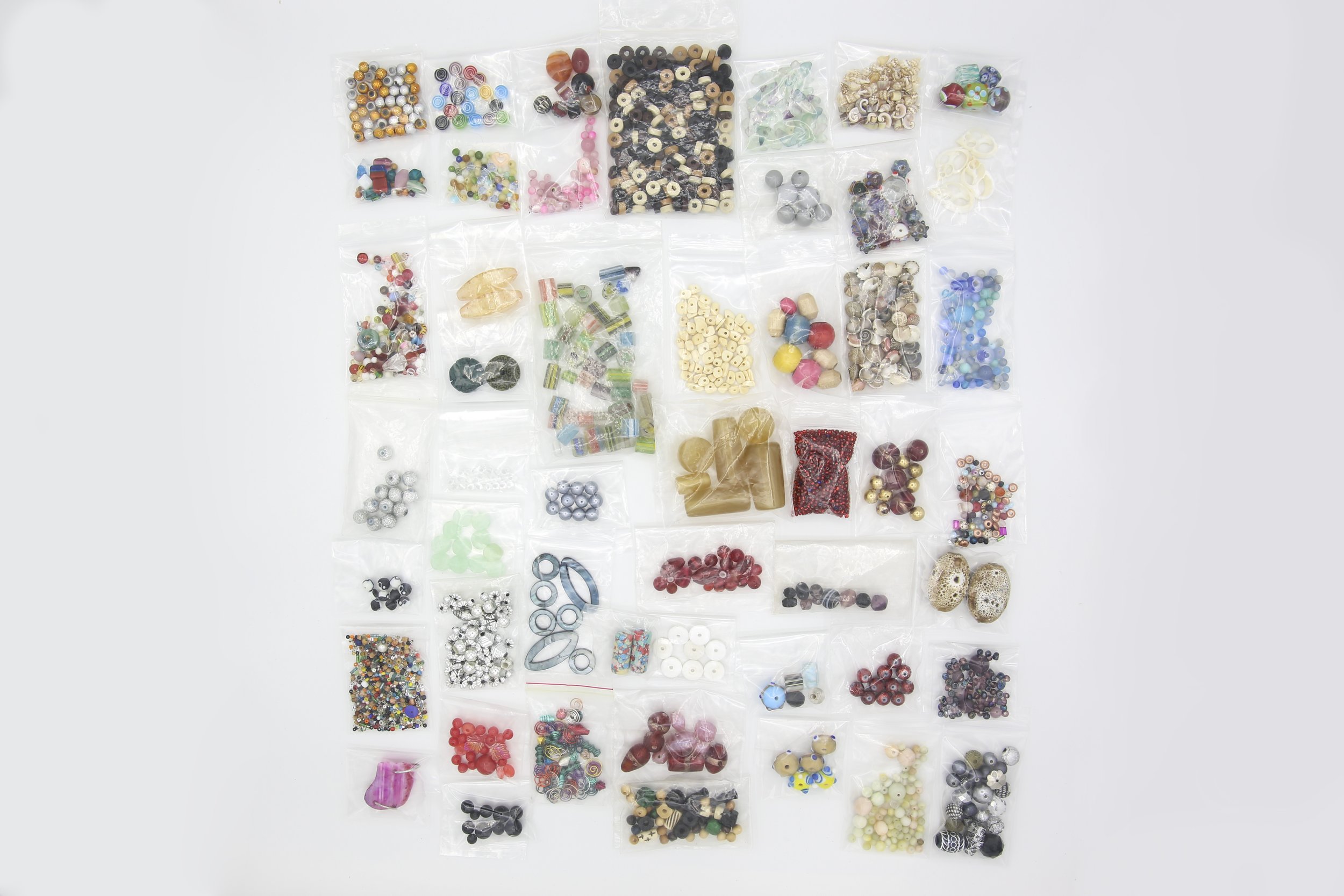 50 BAGS OF BEADS