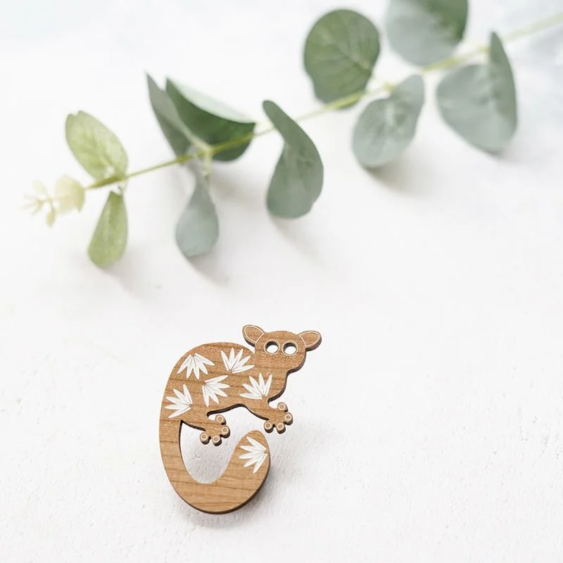 Shark_Alley_White_Painted_Bushbaby_Brooch_grande.jpg